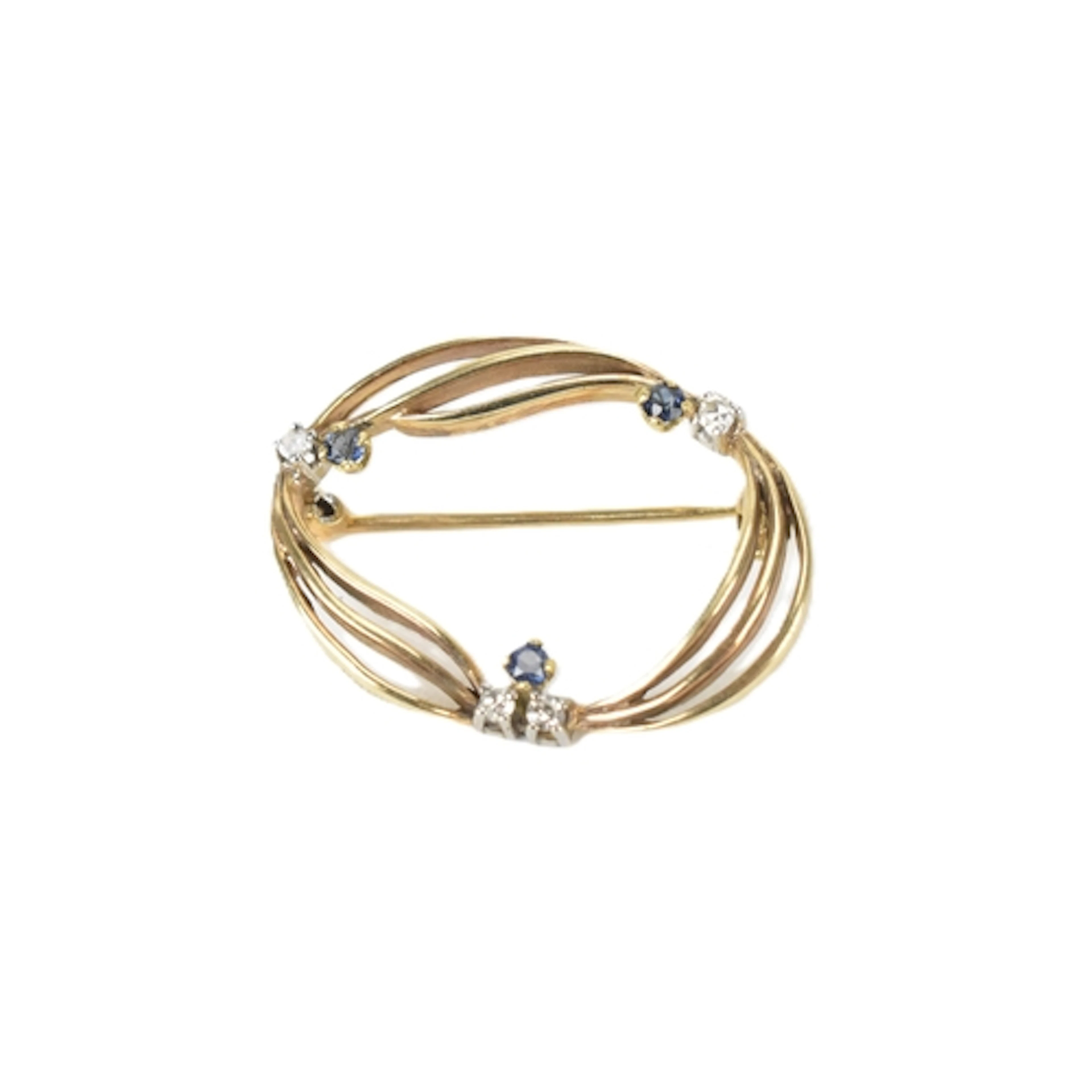 A diamond and sapphire 9ct gold brooch, of open oval form fo...