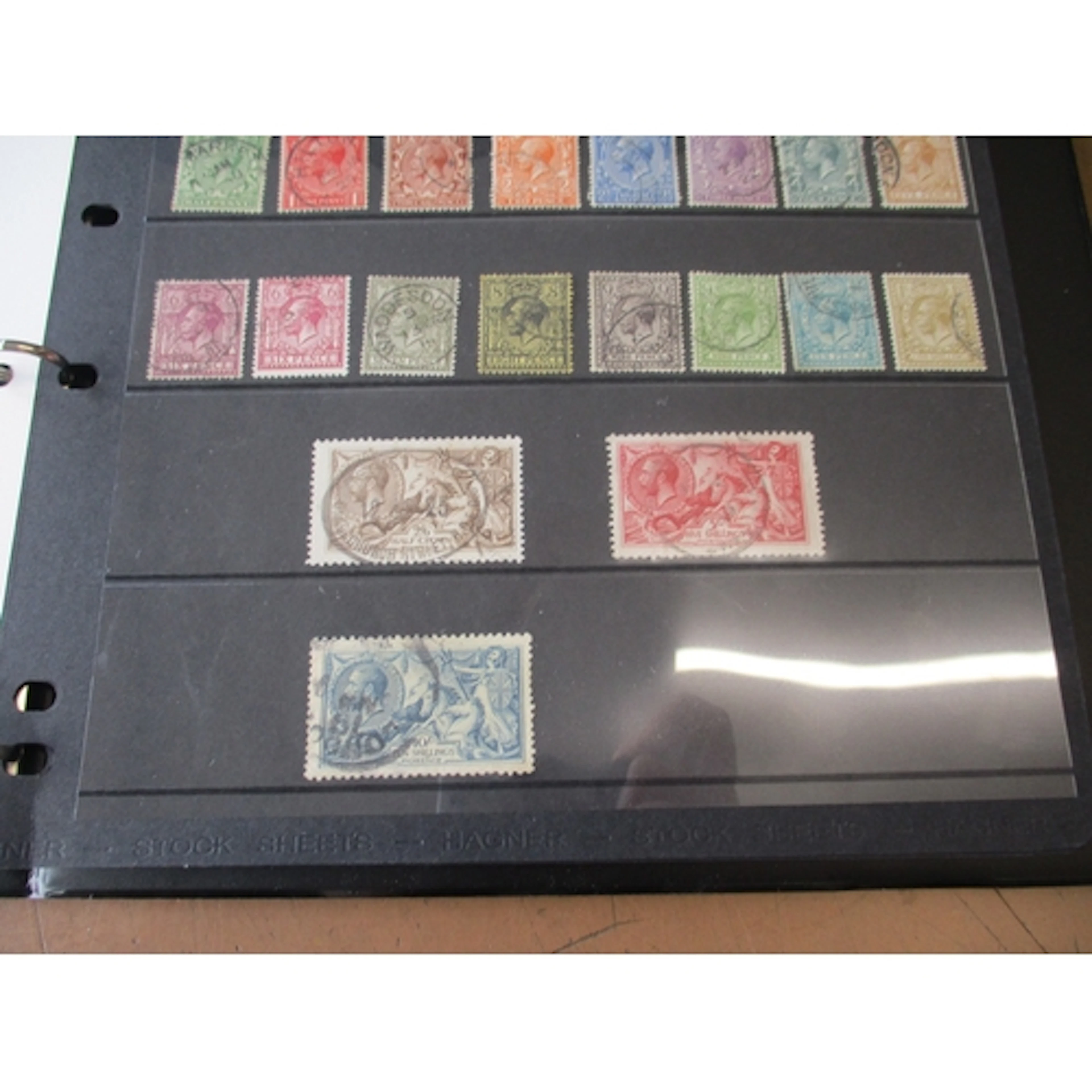 QV-QEII M/U coln in 2 albs and 6 Harrington & Byrne folders,...
