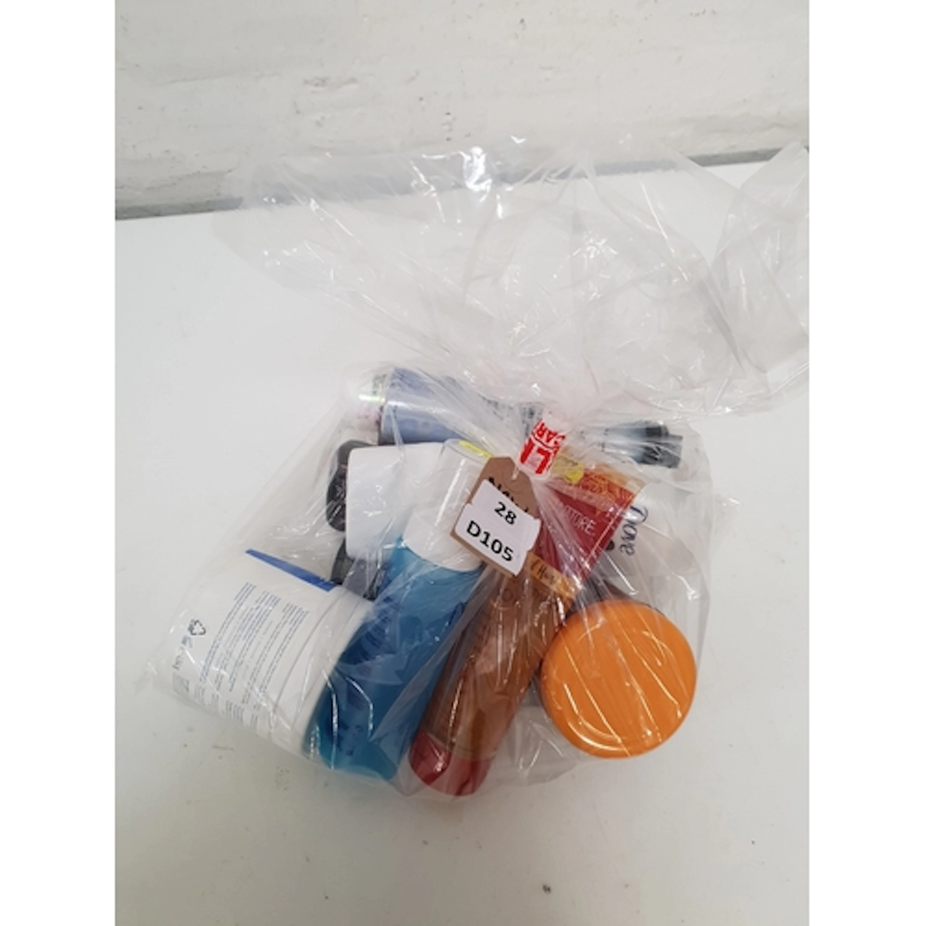 ONE BAG OF COSMETICS AND TOILETRIES including Dove, Malibu,...