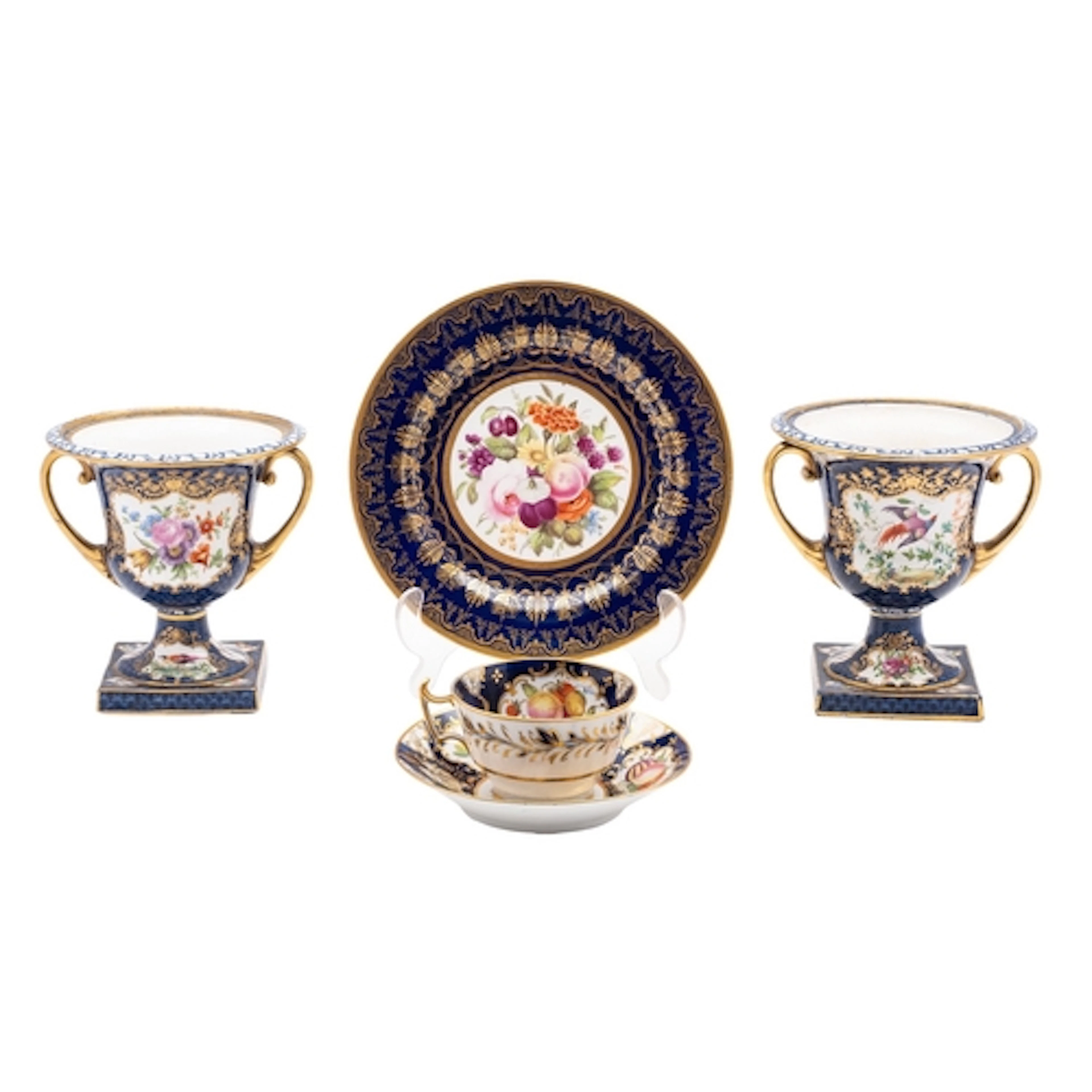 A mixed lot comprising a Coalport dessert plate painted with...