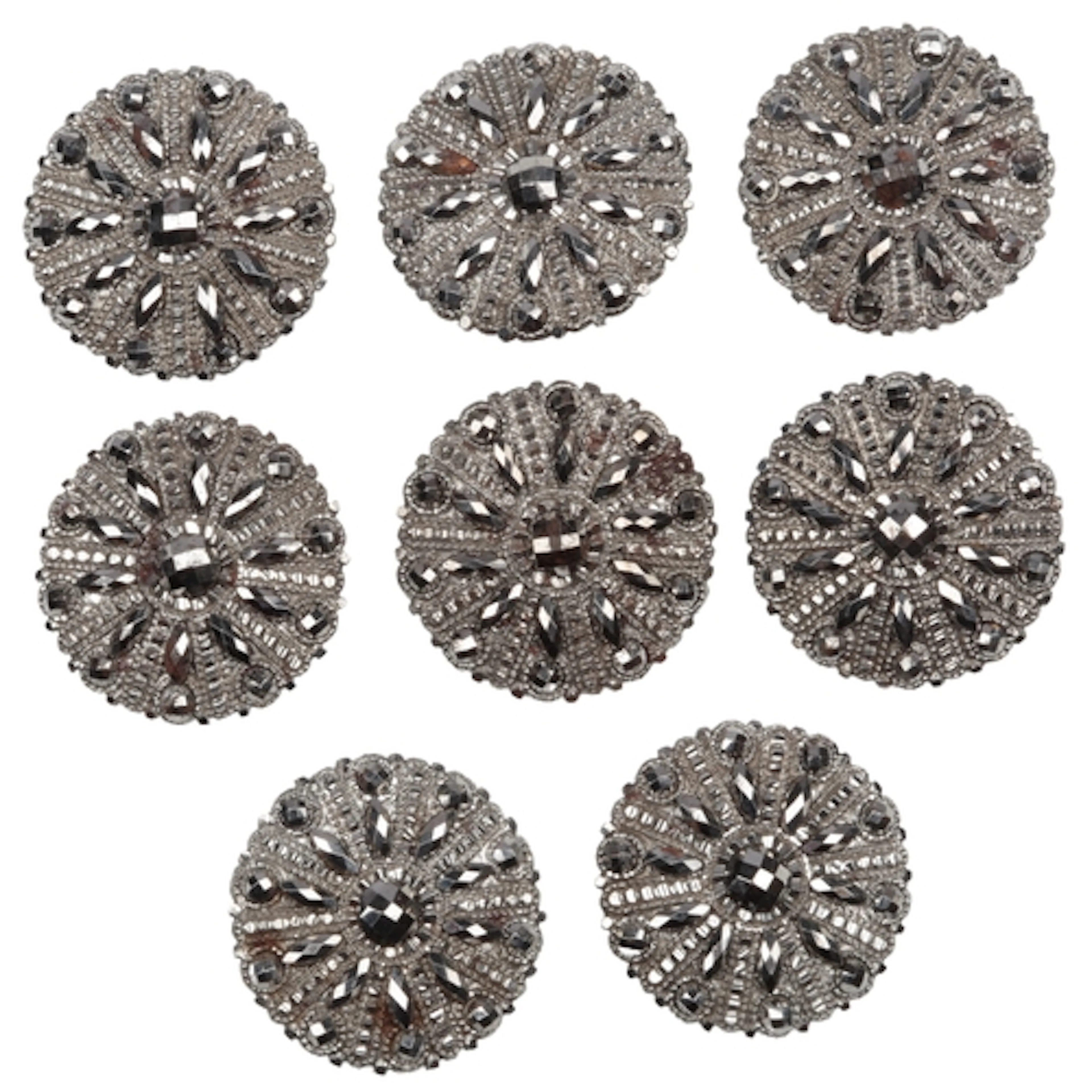 A collection of six cut steel buttons, 19th century, each of...