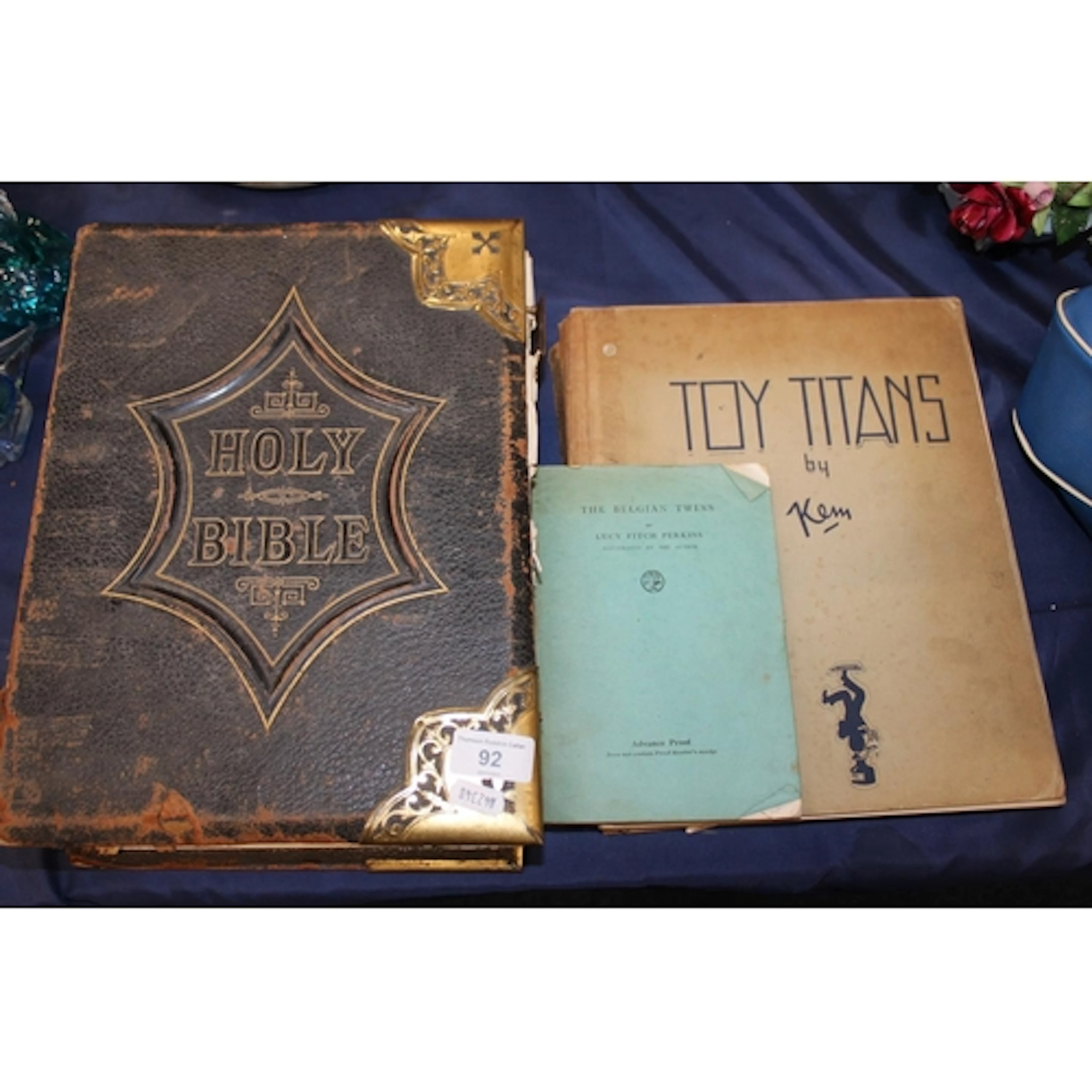 Antique brass bound bible, Toy Titans by Kem book and others...