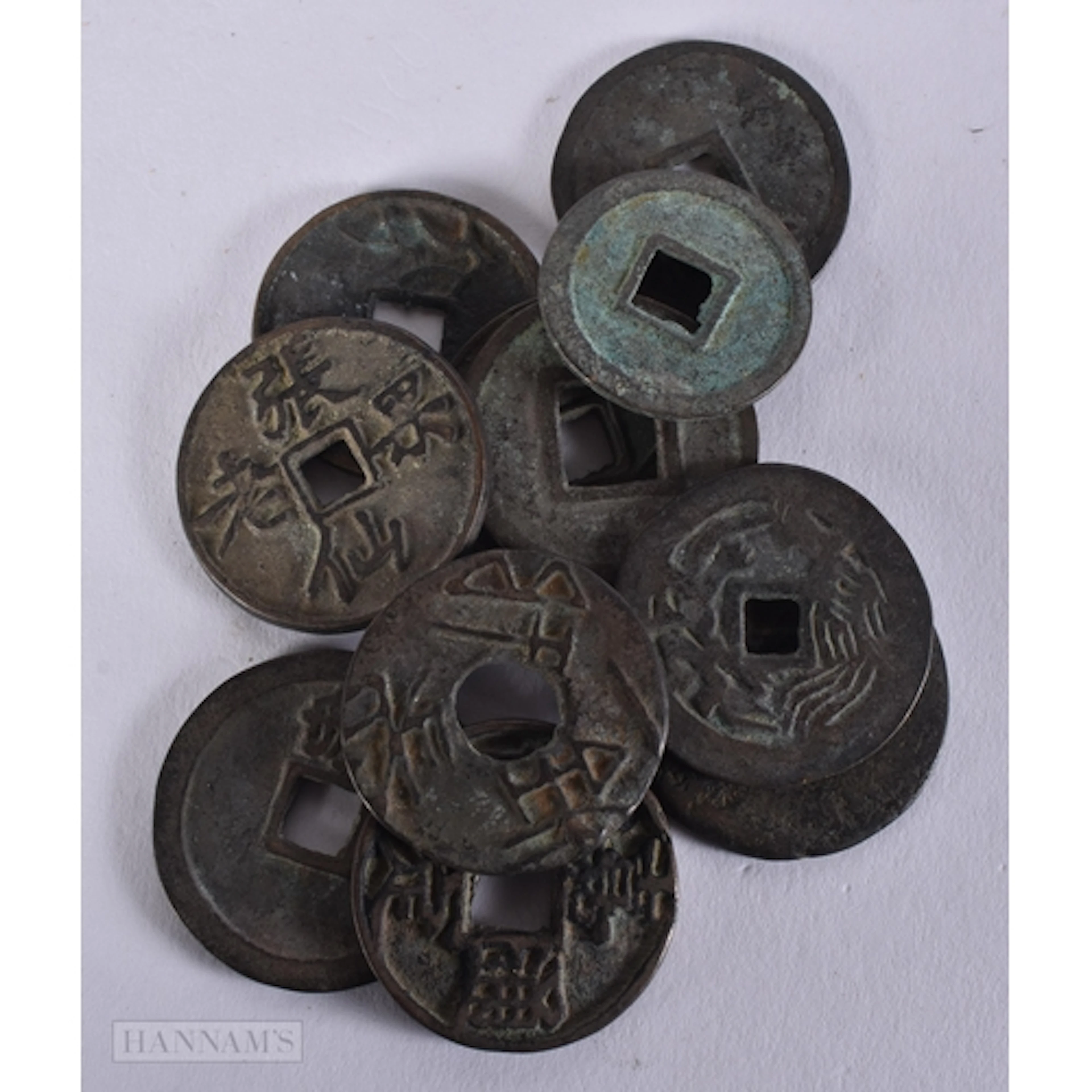 TEN CHINESE COINS. 3.1 cm diameter. 105.8 grams. (10)