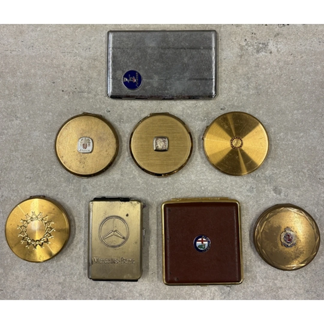 A vintage Alfa Romeo leather and gilt metal cigarette case t...