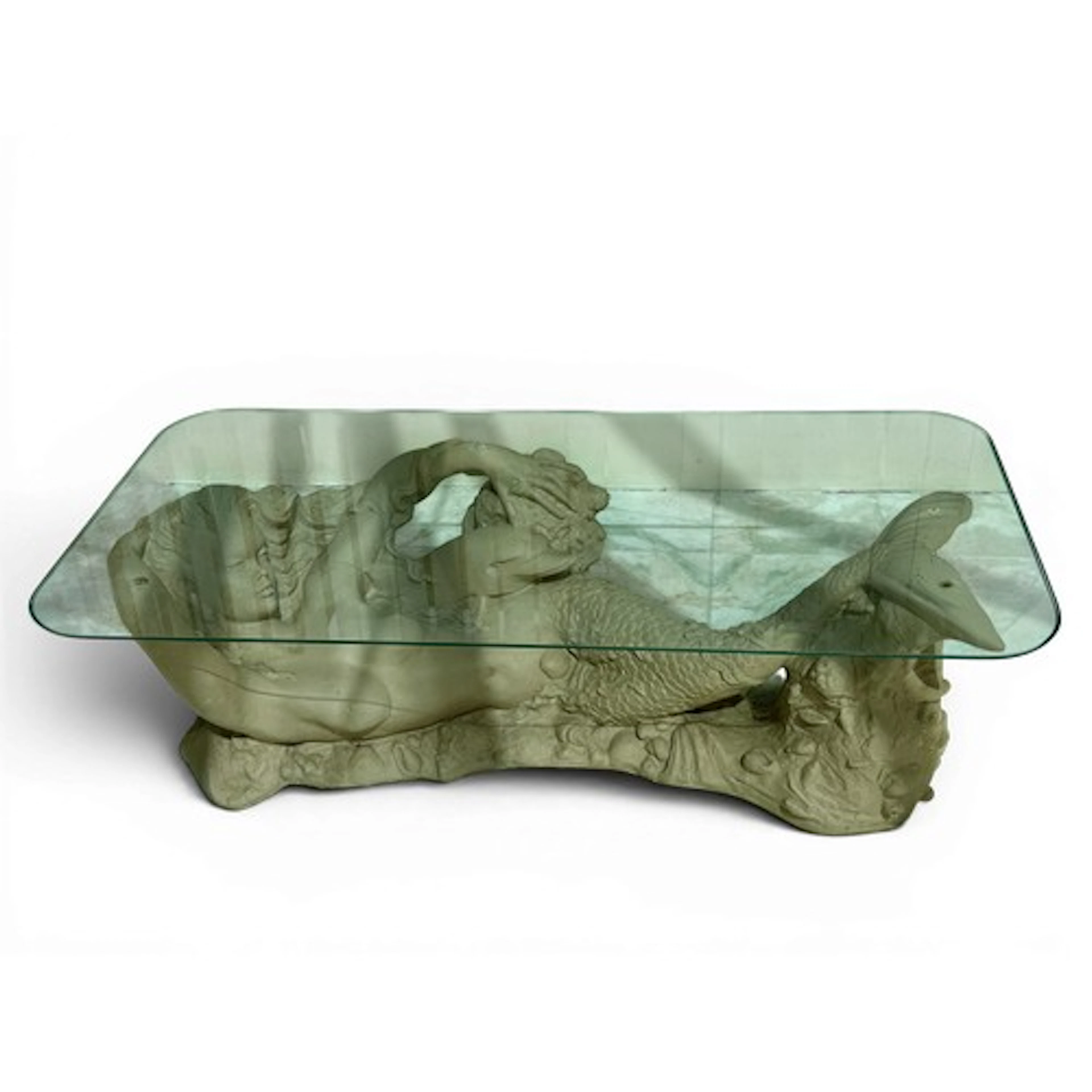 A mermaid glass topped coffee table. 122cm l x 61cm w x 41cm...