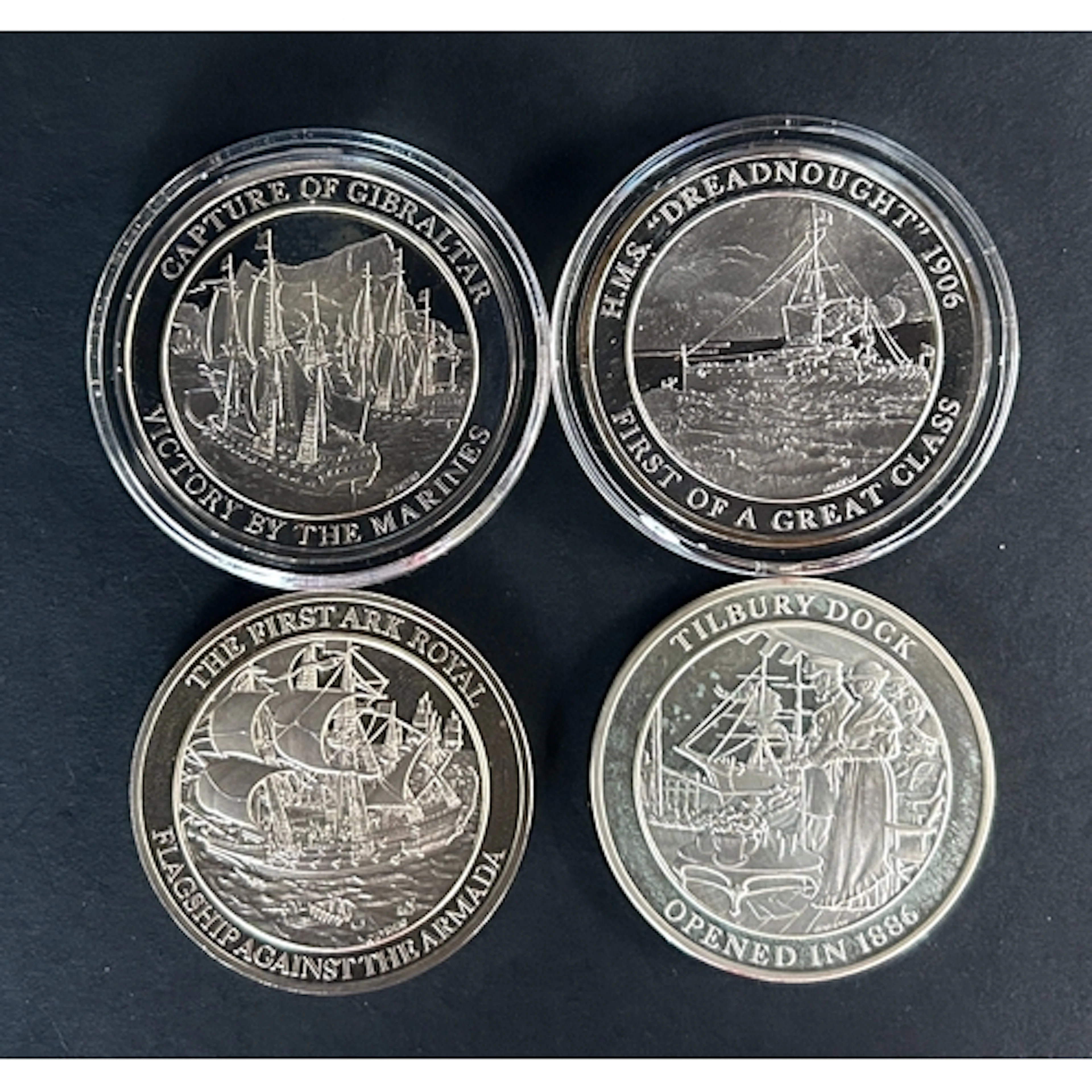 A group of four sterling silver medallions from The Mountbat...