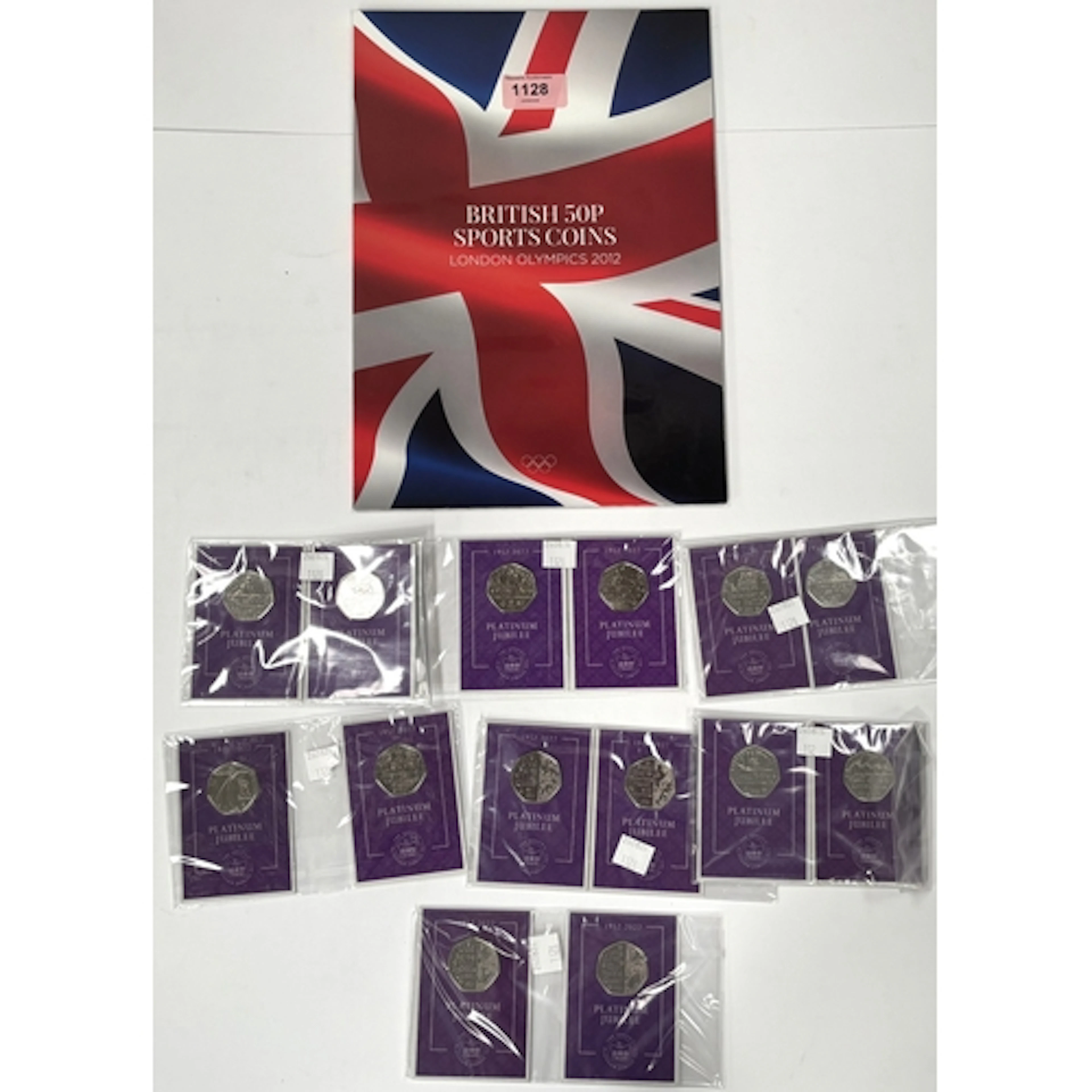 A collection of 14 1952-2022 platinum jubilee 50p's in packe...