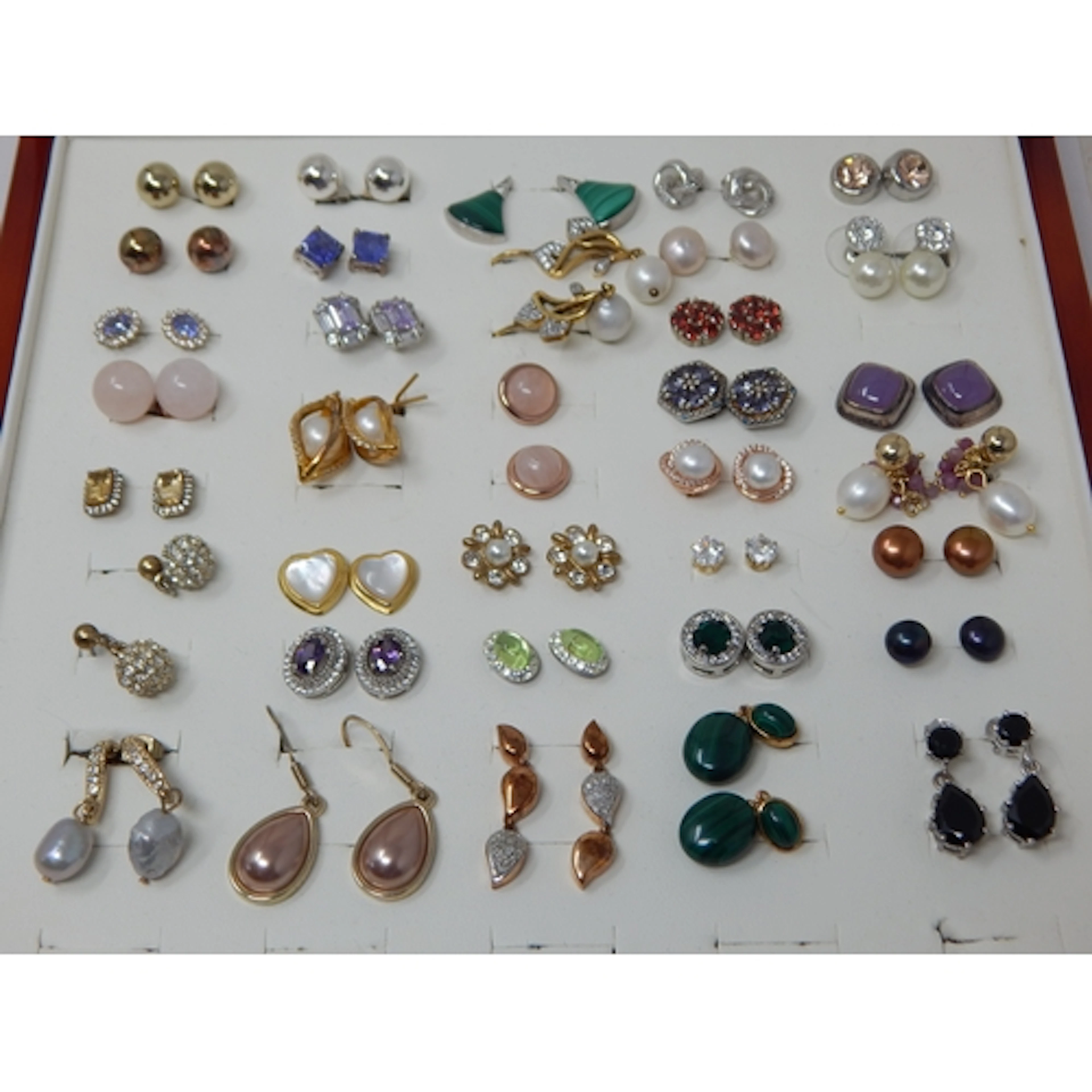 A Collection of Gold on Sterling Silver Earrings Comprising ...