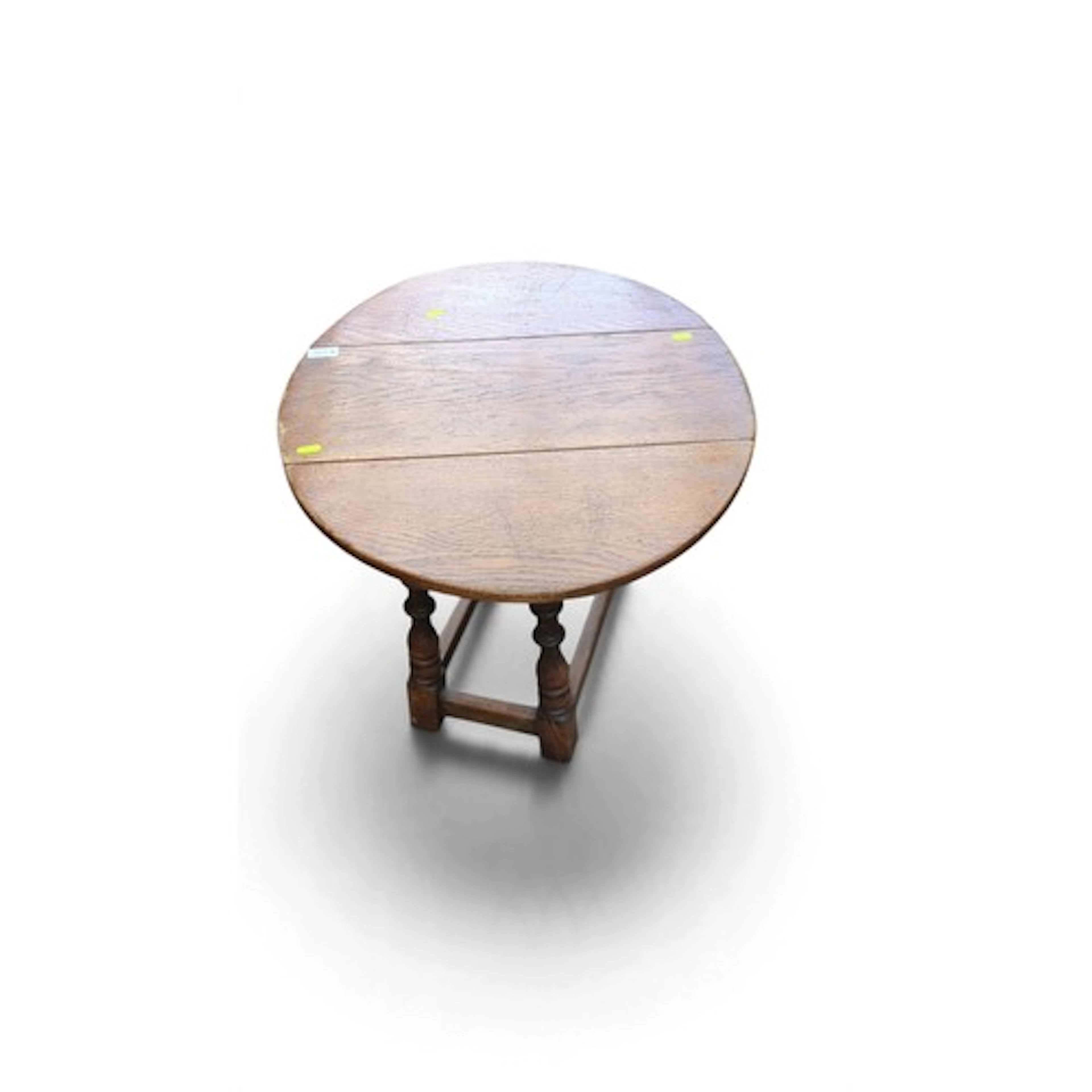 Oak drop-leaf occasional table, the circular top folding to ...