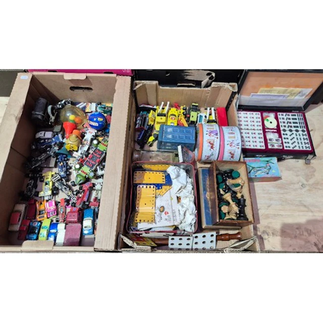 Two boxes of assorted vintage toys to include diecast vehicl...