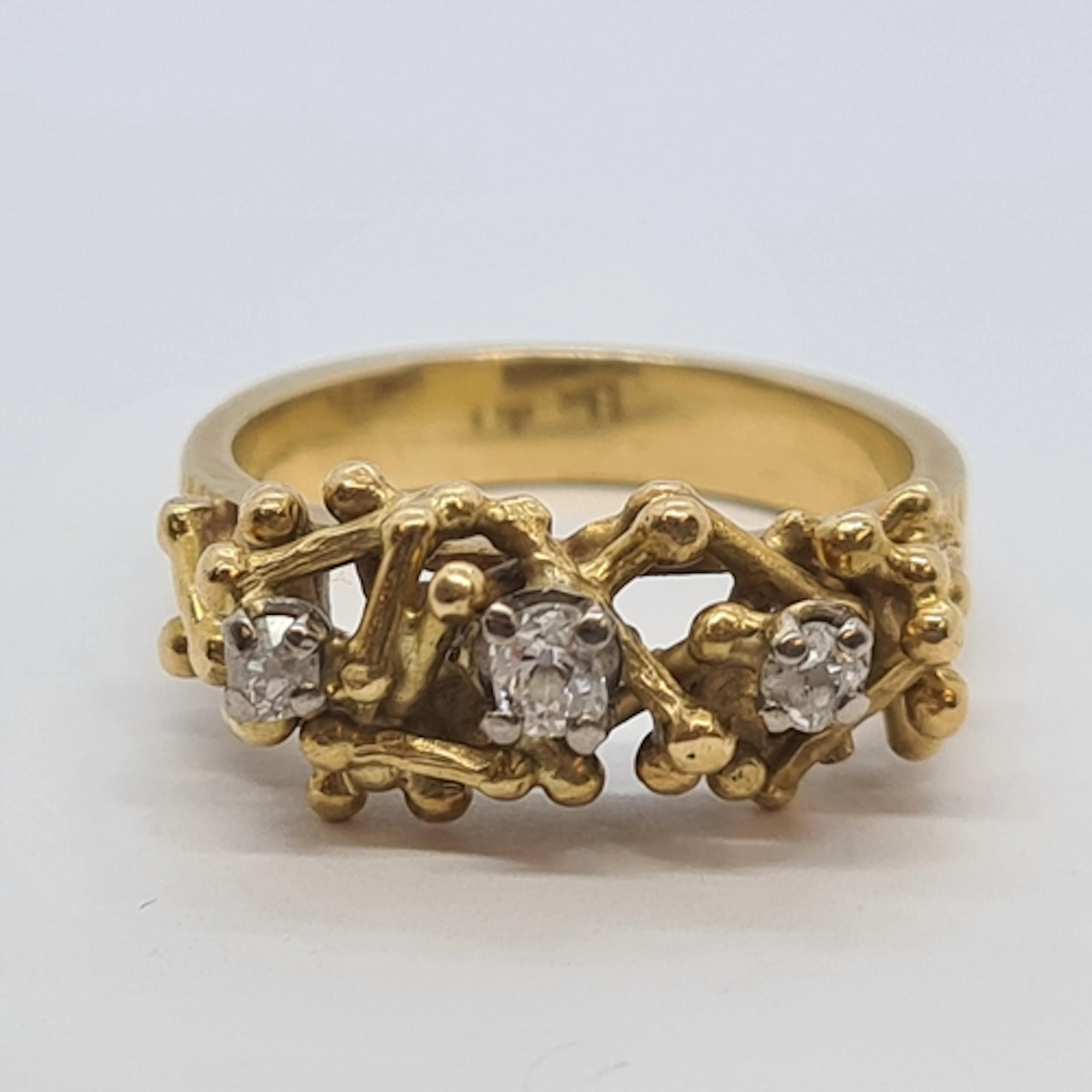 A 1970s Alan Martin Gard Diamond Ring, three claw-set cushio...