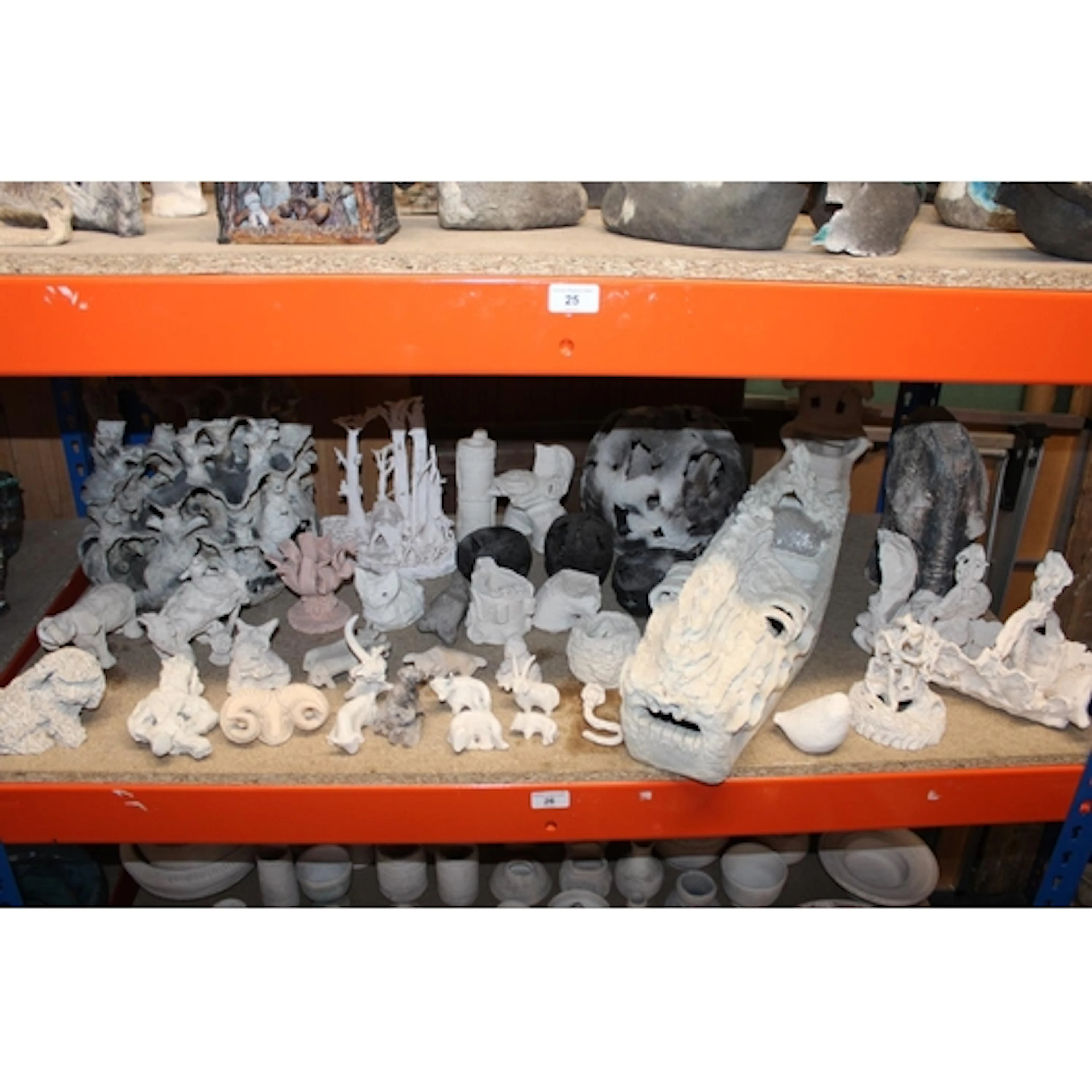 Shelf of unglazed Oxshott Pottery models. Provenance: ...