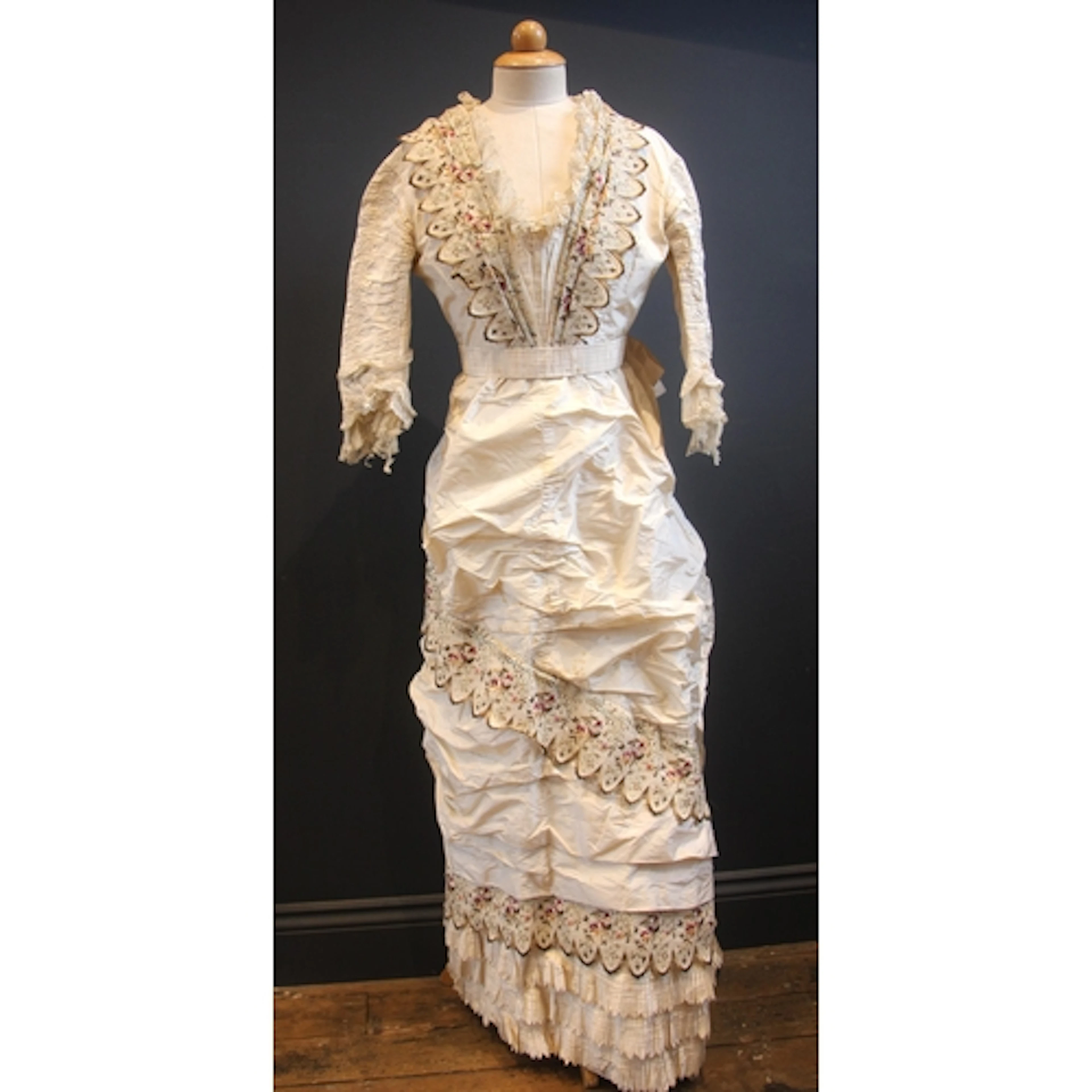 A Victorian ladies day dress, circa 1880, the bodice of silk...