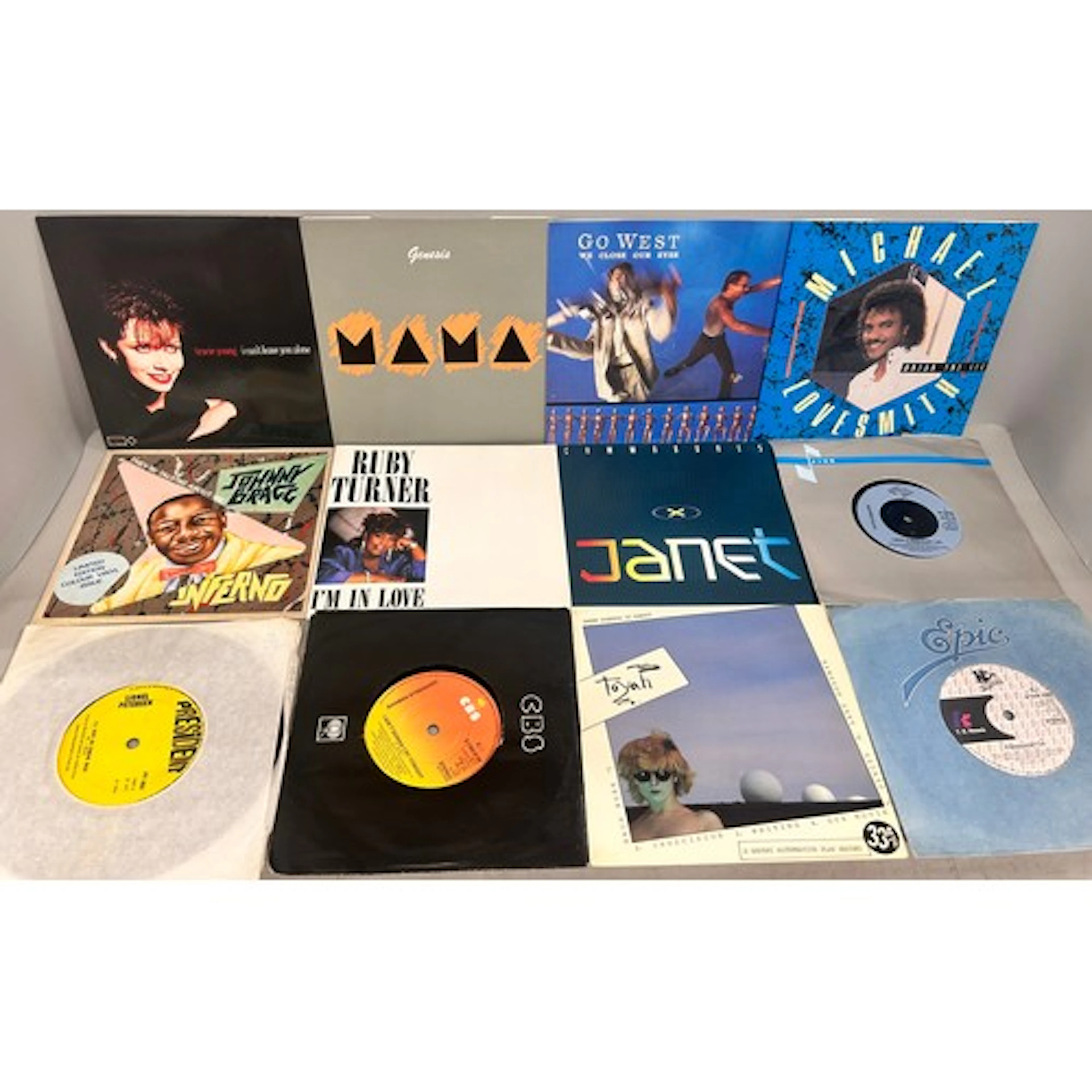 Collection of 45rpm singles to include Tracie Young, Genesis...