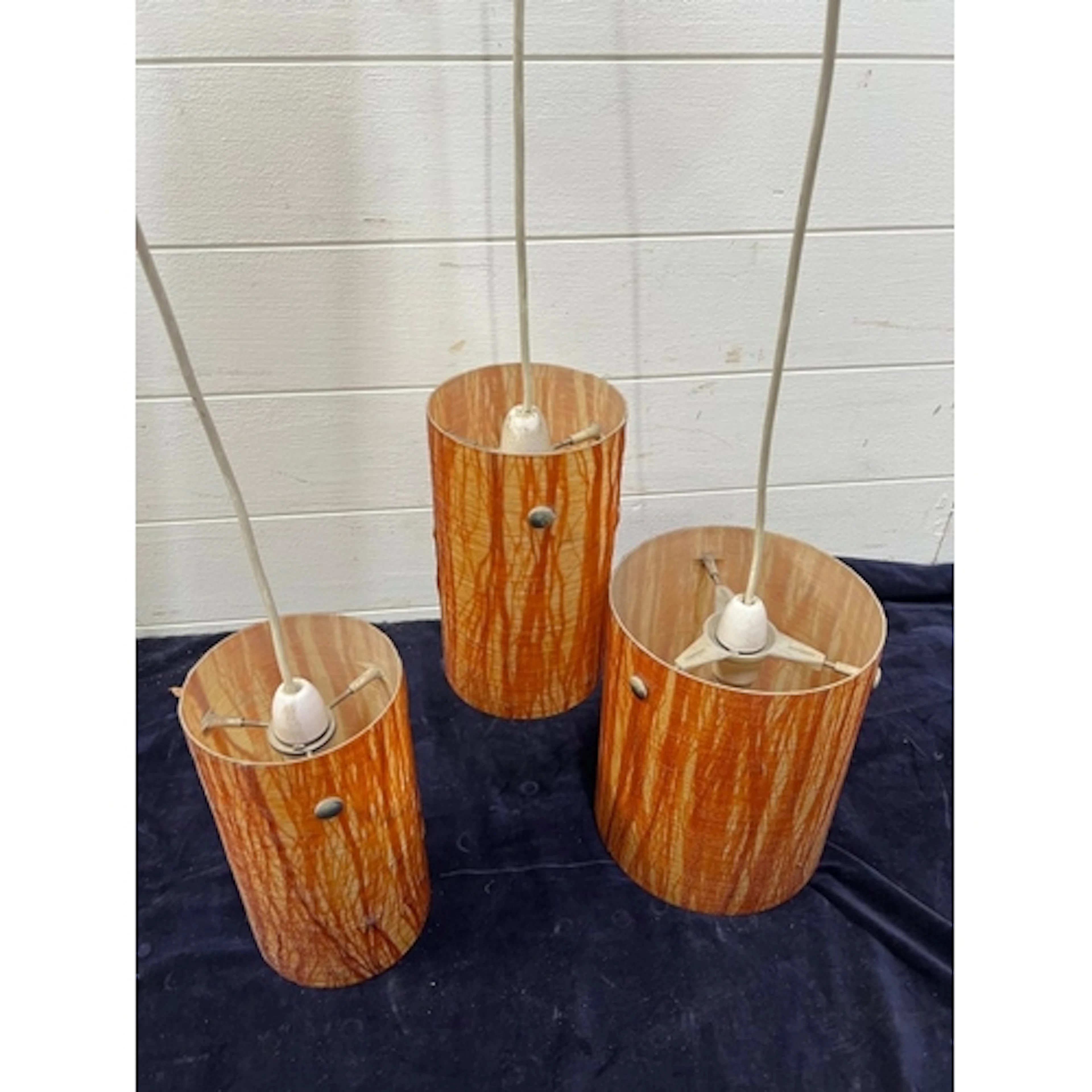 A 1950's tree themed three pendant ceiling lamp.