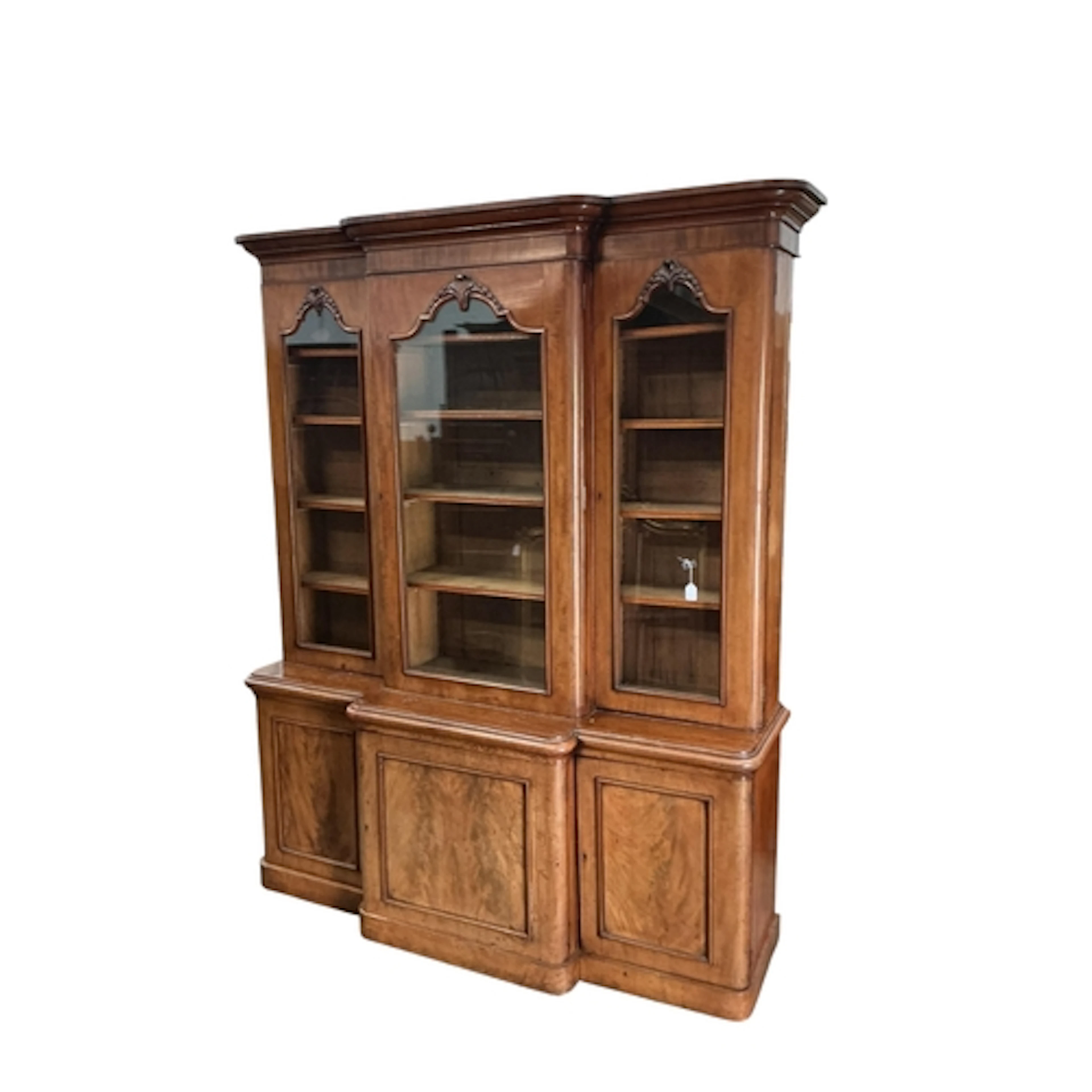 A Victorian mahogany breakfront bookcase, width 197cm, depth...