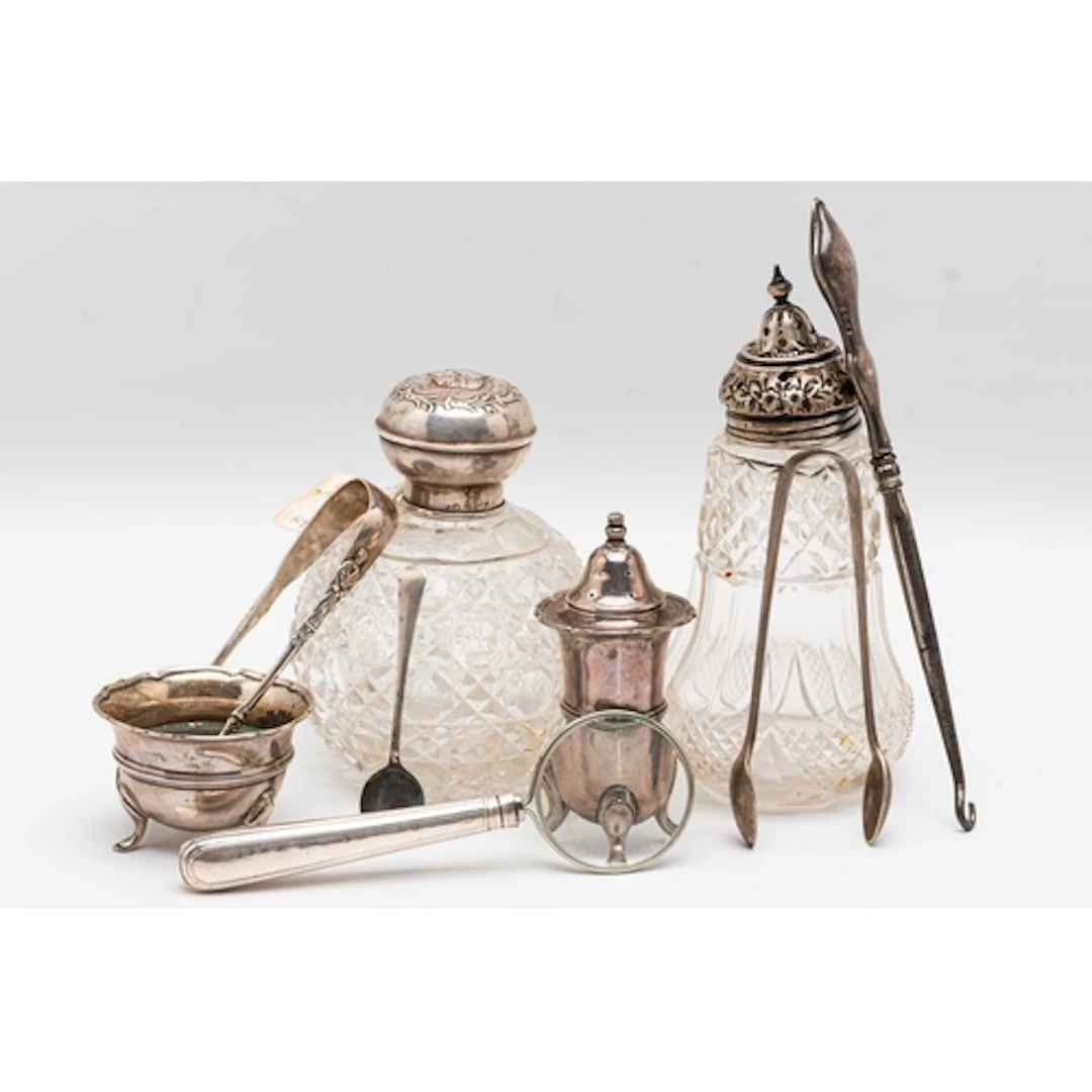 AN ASSORTMENT OF SILVER ITEMS, to include a matching pepper ...