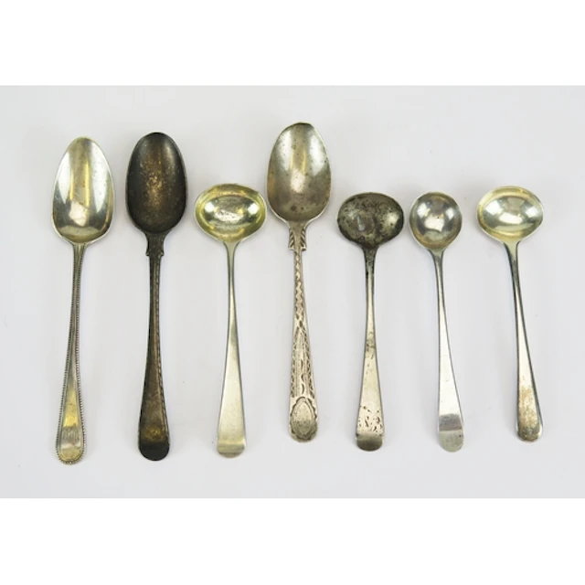 Four silver condiment spoons and three silver teaspoons, var...