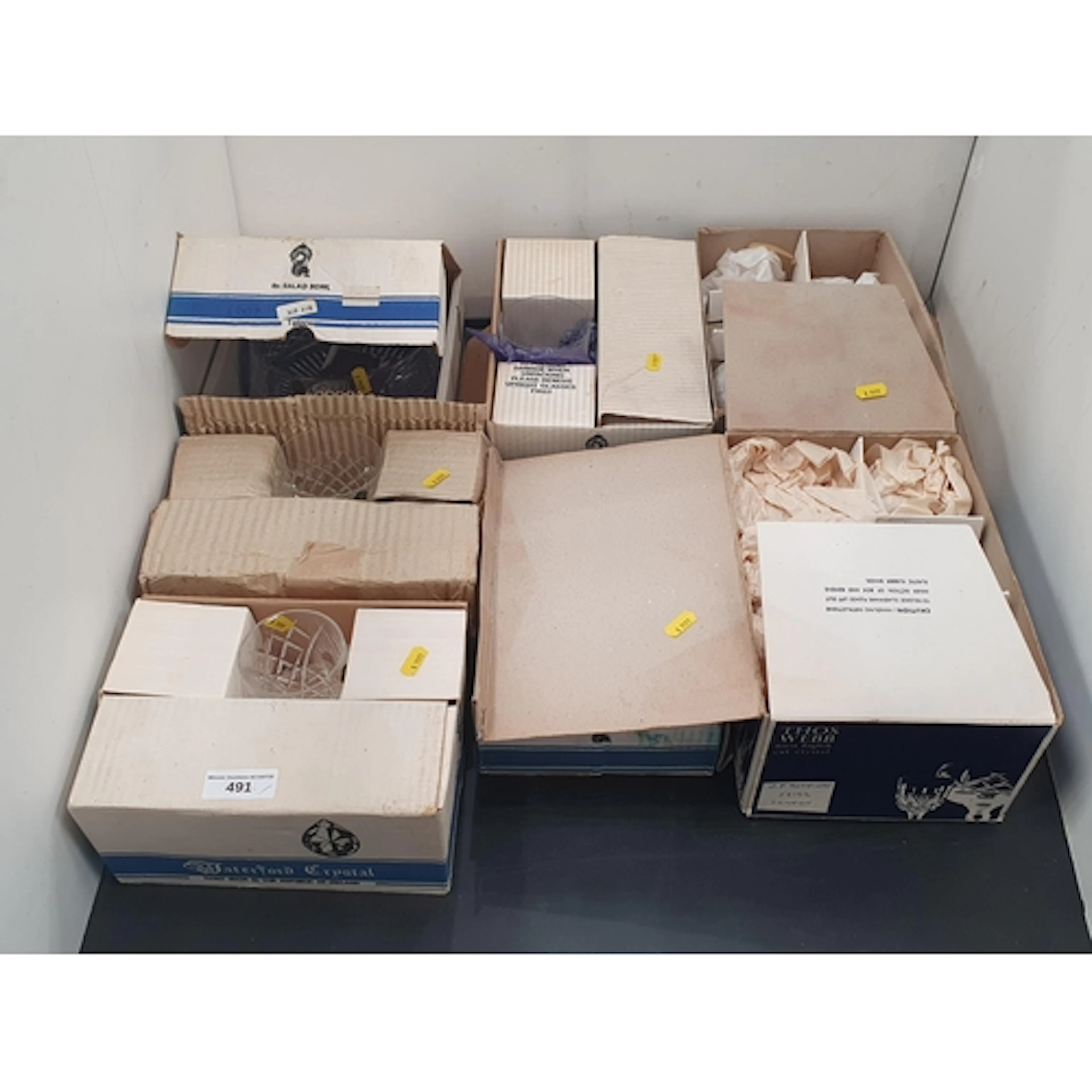 A collection of boxed Thomas Webb and Waterford Crystal Tumb...