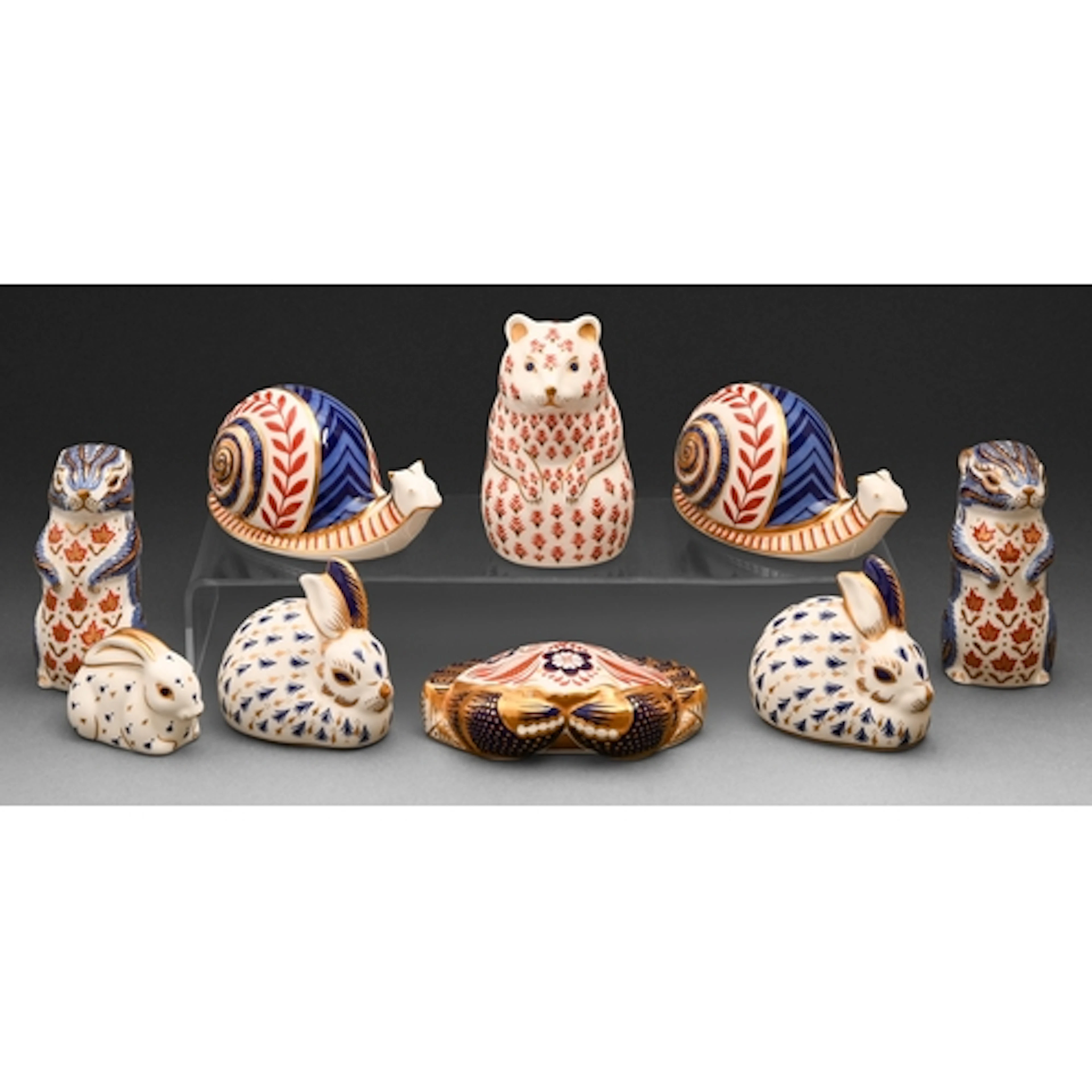 Nine Royal Crown Derby paperweights, to include Snail and Cr...