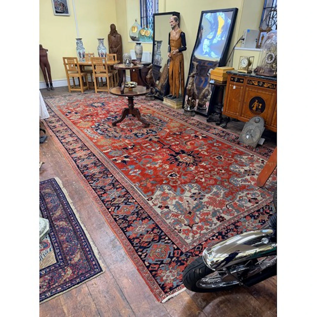 A good Heriz country house woven wool carpet , with floral a...