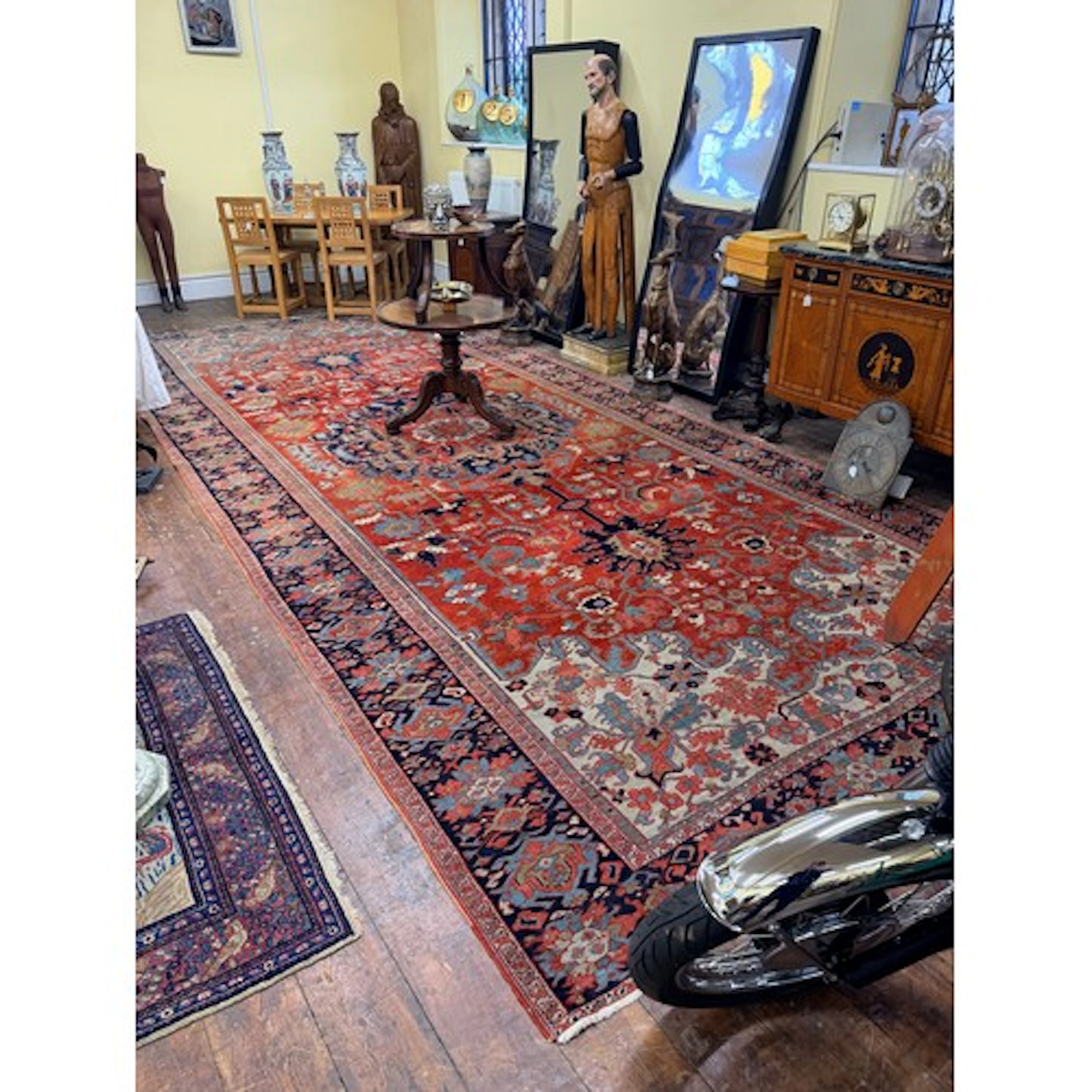 A good Heriz country house woven wool carpet , with floral a...