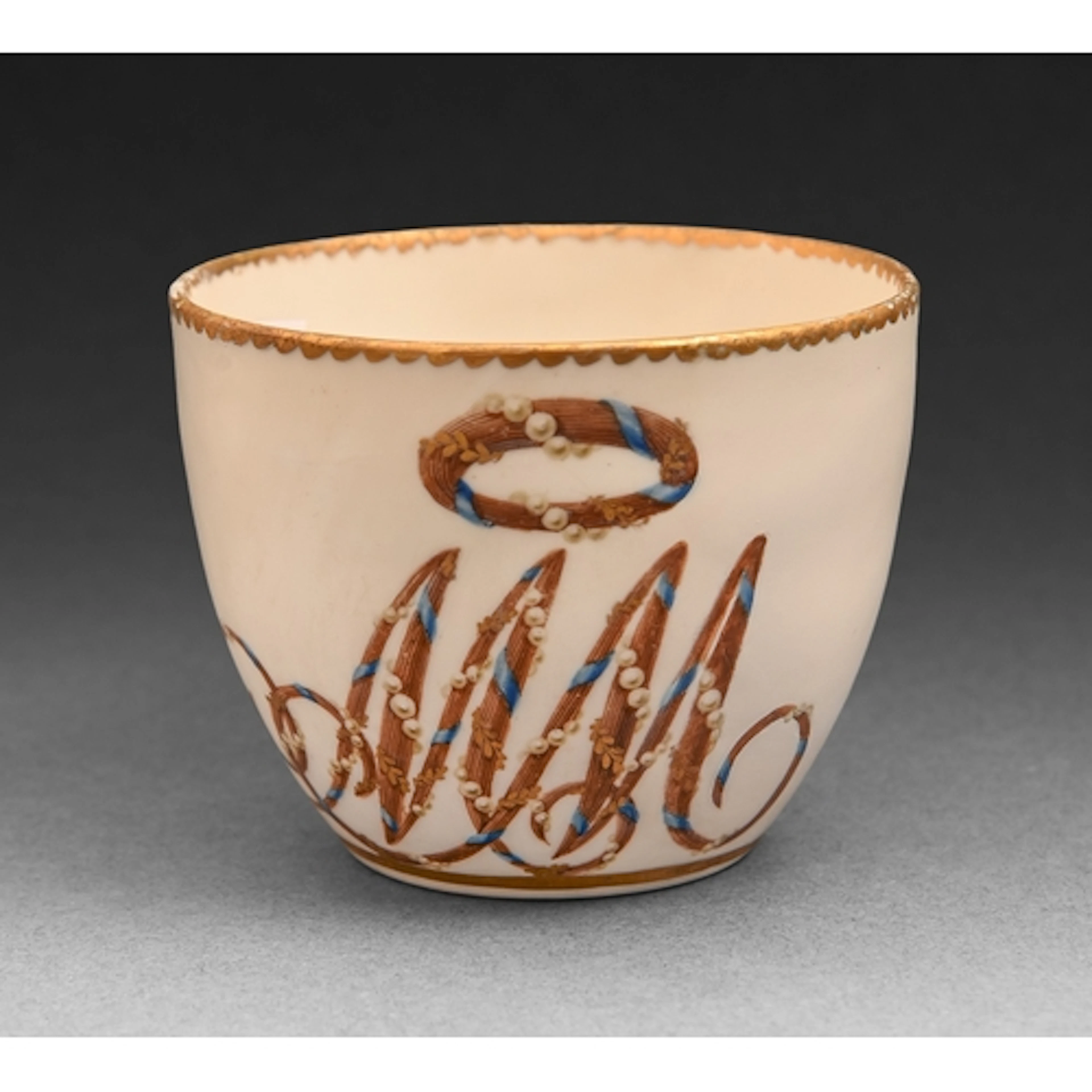 A Derby monogrammed teacup, c1795, of bute shape, enamelled ...