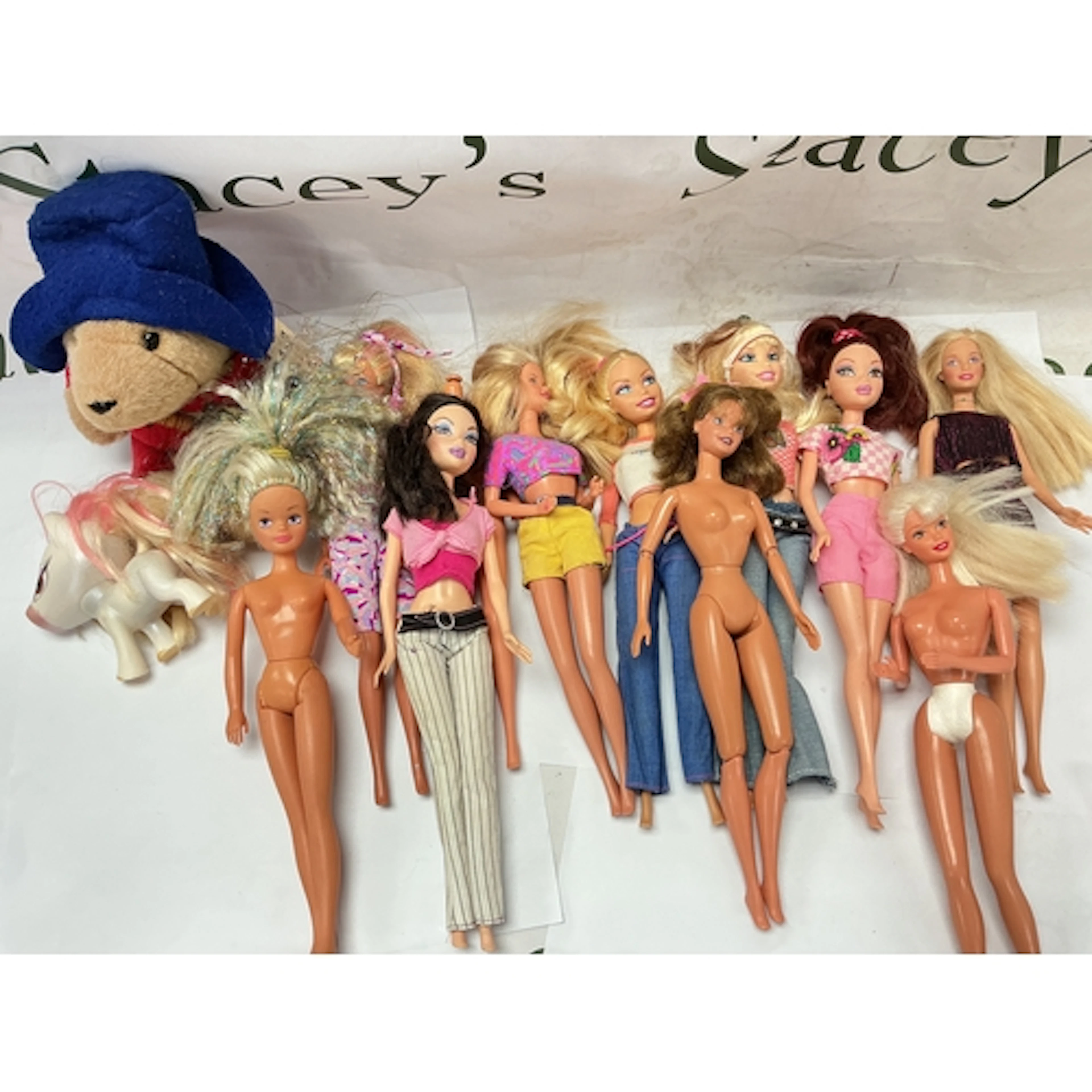 A Collection Of Loose Barbies/Sindys, A Paddington And Brats...