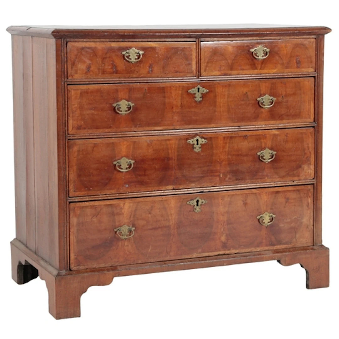 A walnut chest of drawers, early 18th century, the moulded c...