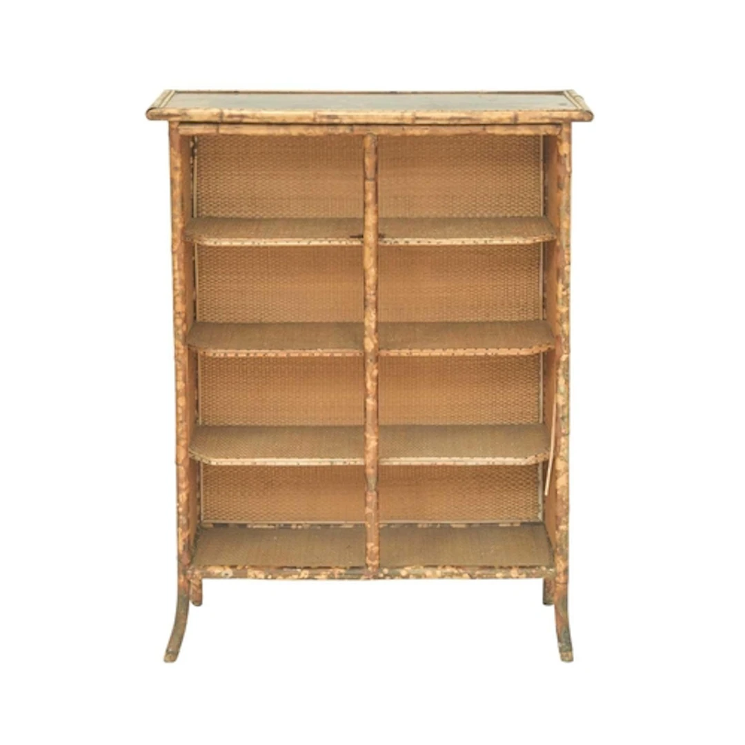 A Victorian bamboo and lacquered open bookcase. The top lacq...
