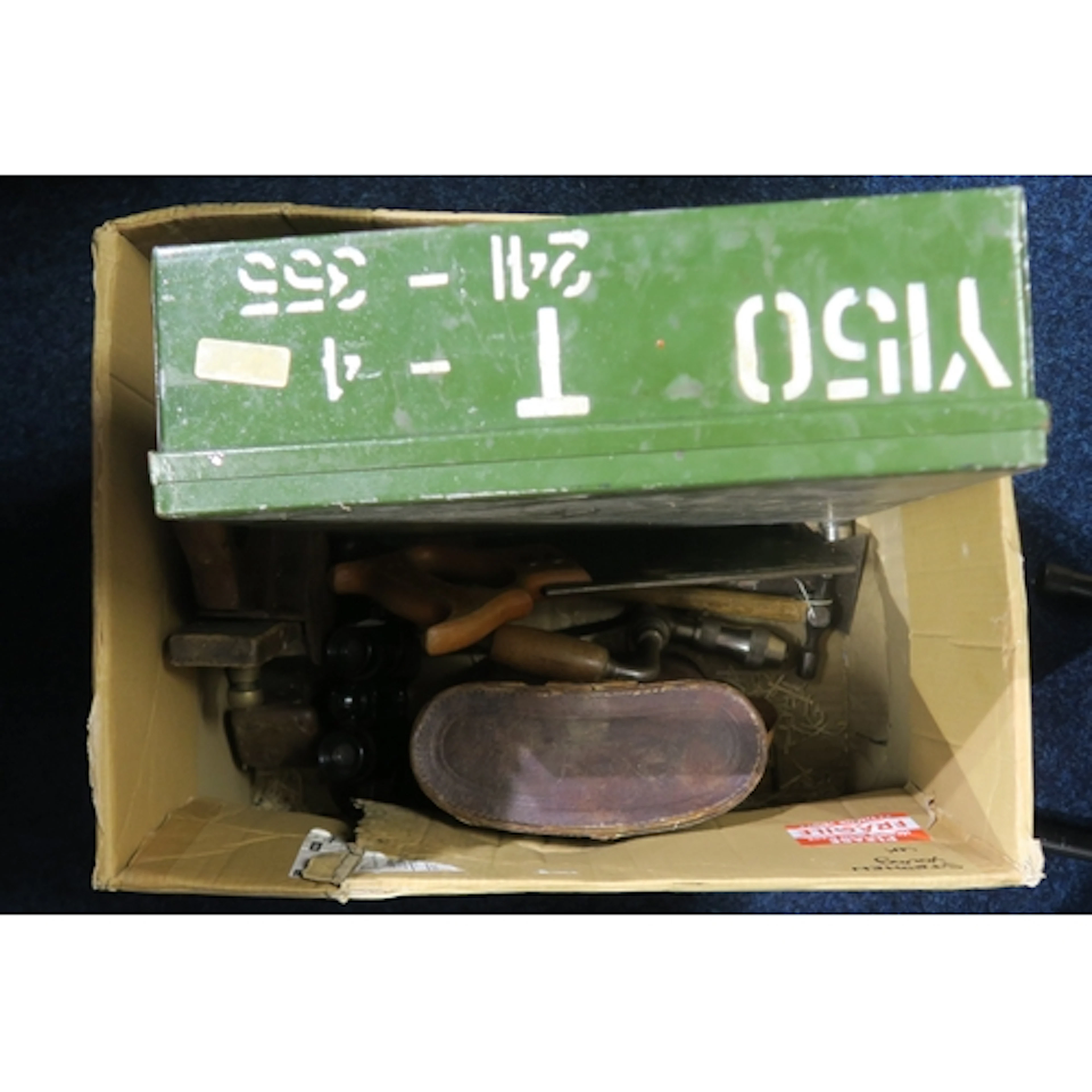 A small assortment of vintage tools, including a tenon saw b...