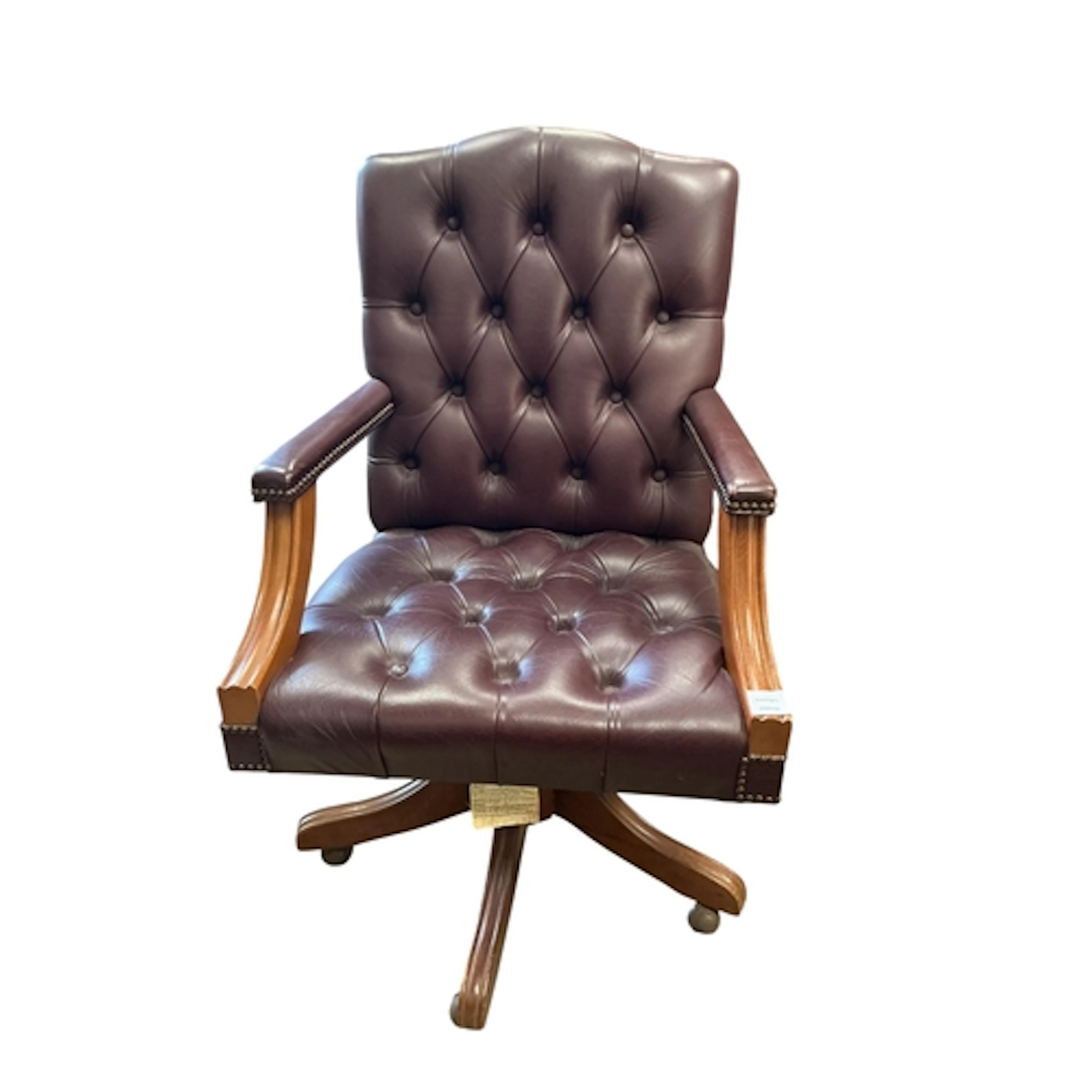 A reproduction buttoned swivel desk chair, width 63cm, depth...