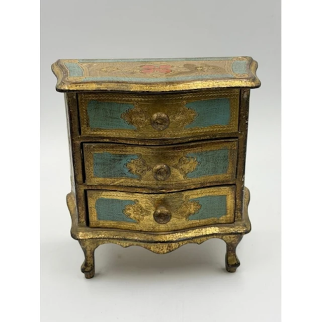 A Florentine miniture chest of drawers, bow fronted shape wi...