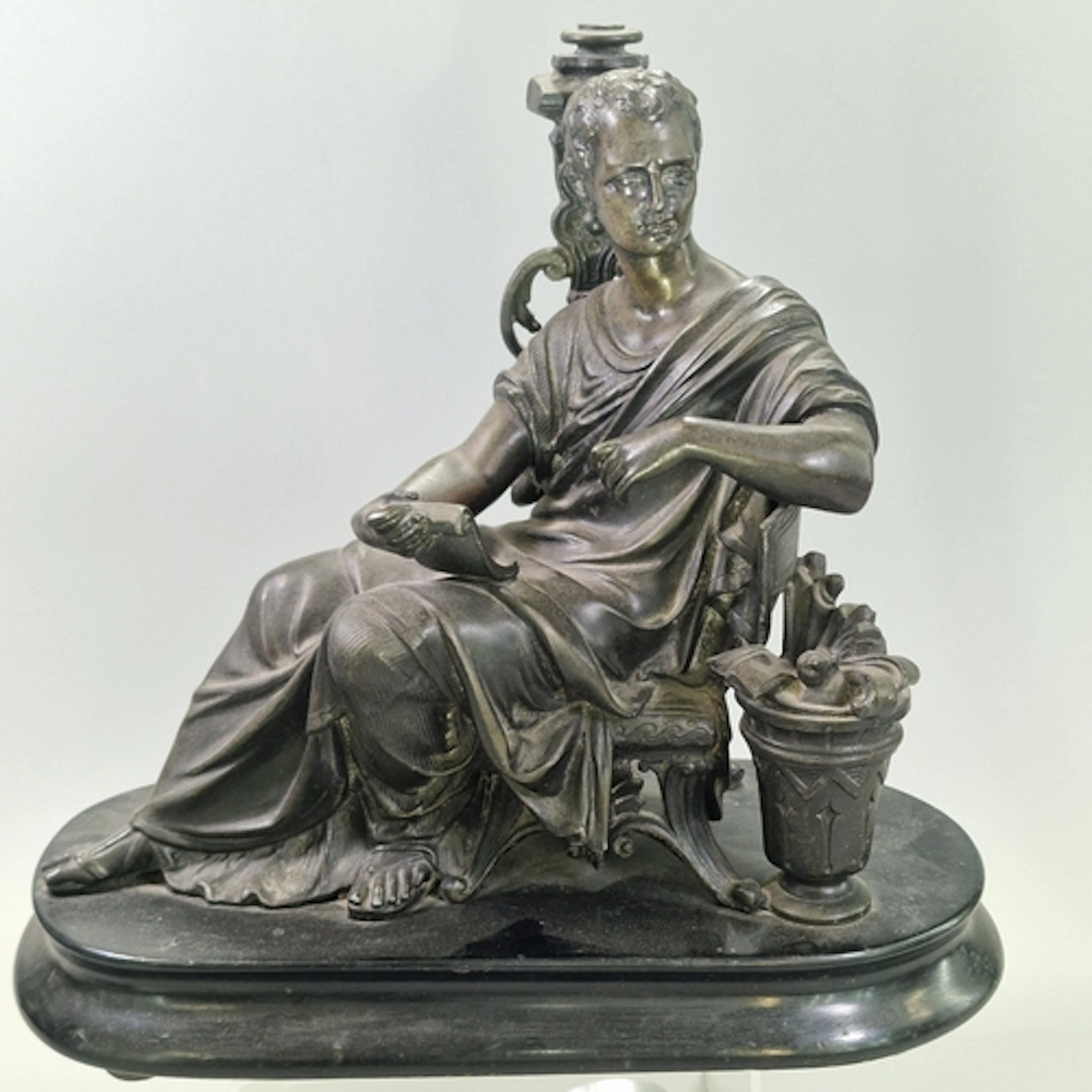 Grand Tour type hollow bronze sculpture of a seated classica...
