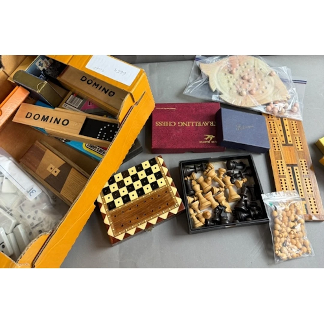 A selection of playing cards, chess boards and dominoes...