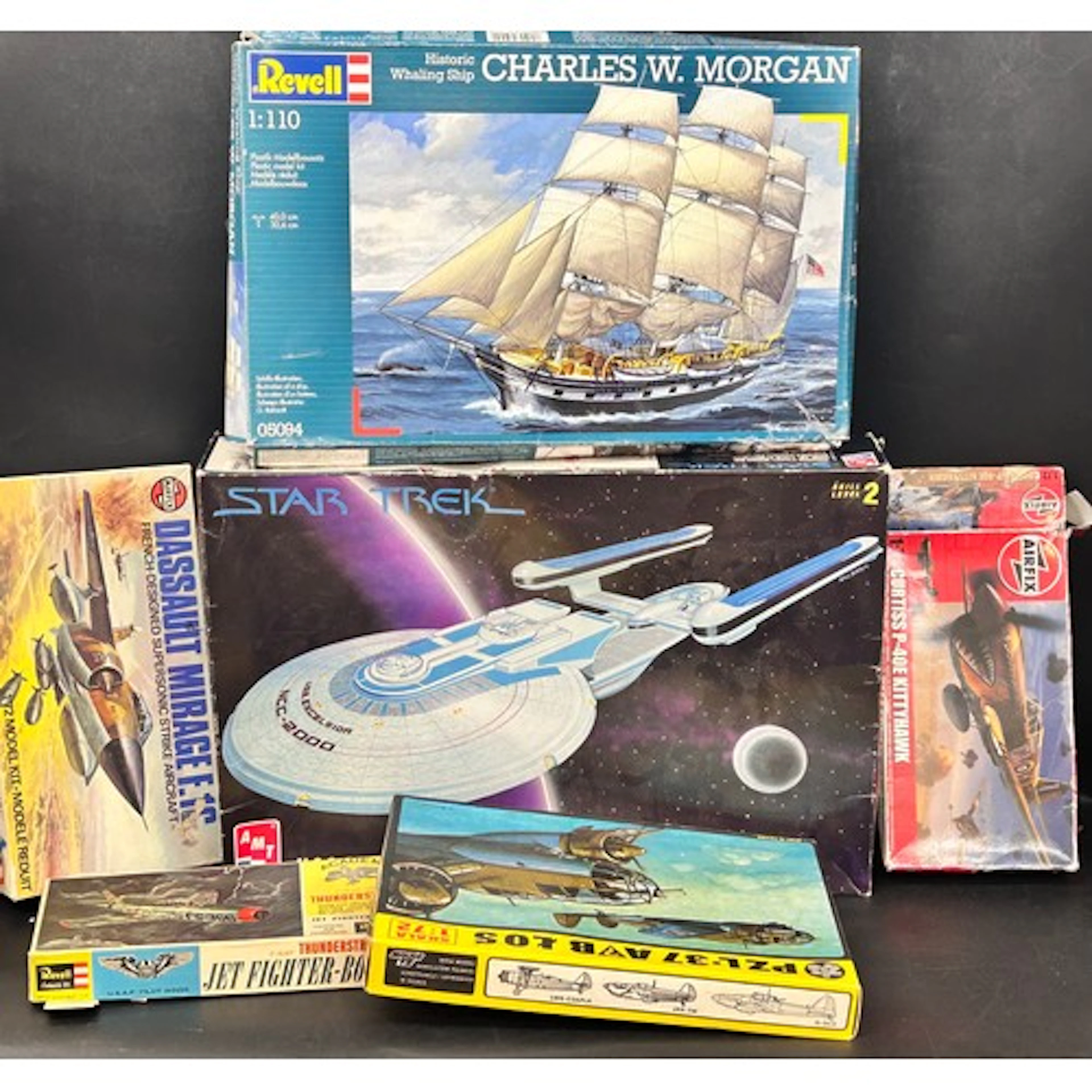 A collection of boxed models including Revell and Ertl Star ...
