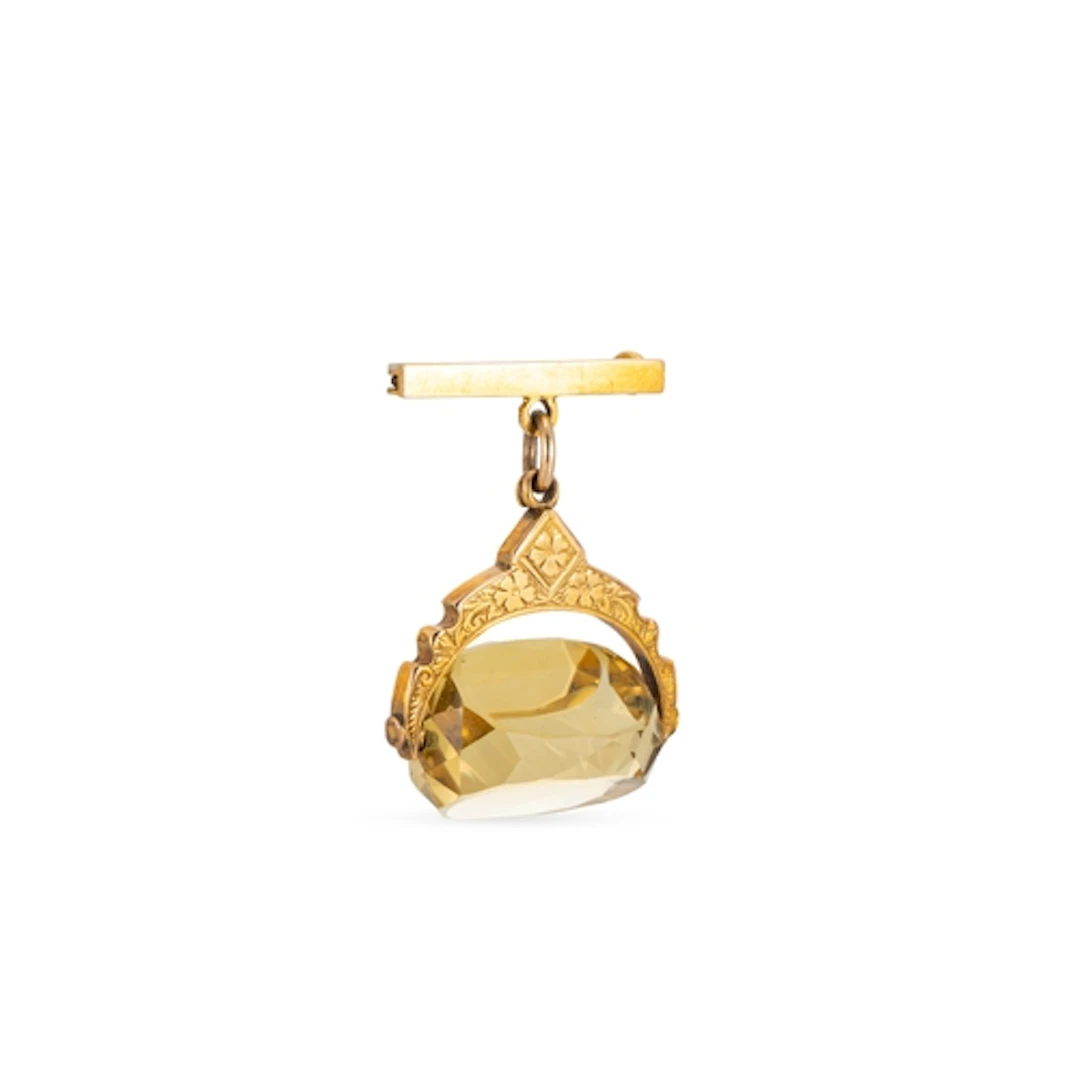 A 9CT GOLD SWIVEL SEAL, set with citrine