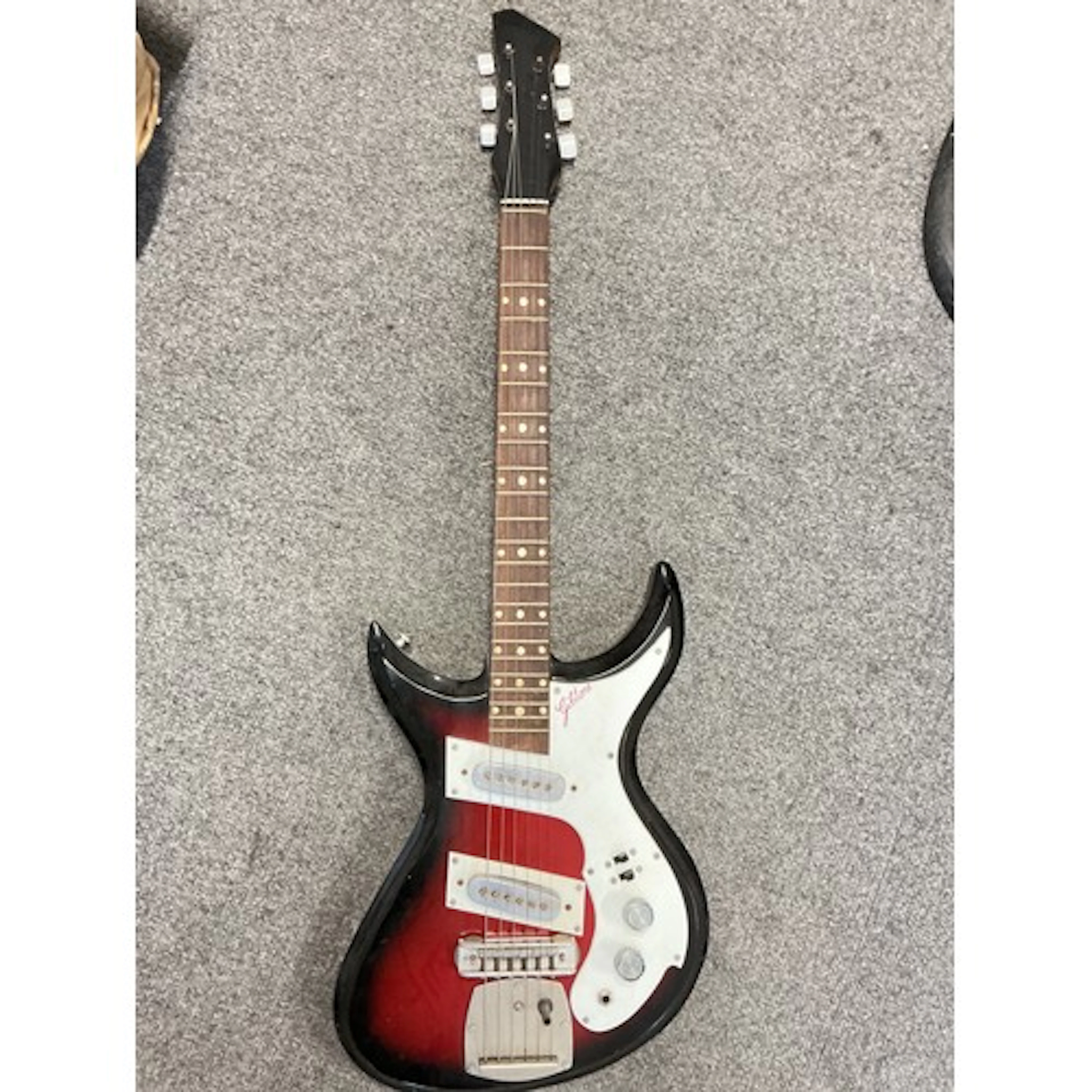 An Indian made Gibtone electric guitar, no case.