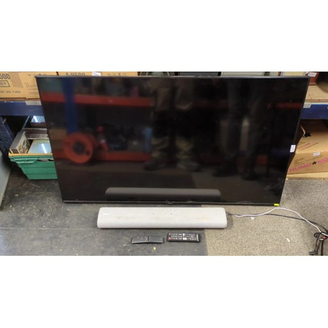 Samsung UE55TU7020K 55-inch smart television with Samsung HW...