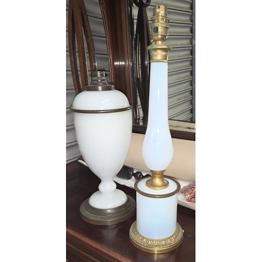 A VINTAGE LAMP BASE, ormolu mounts with milk glass column an...