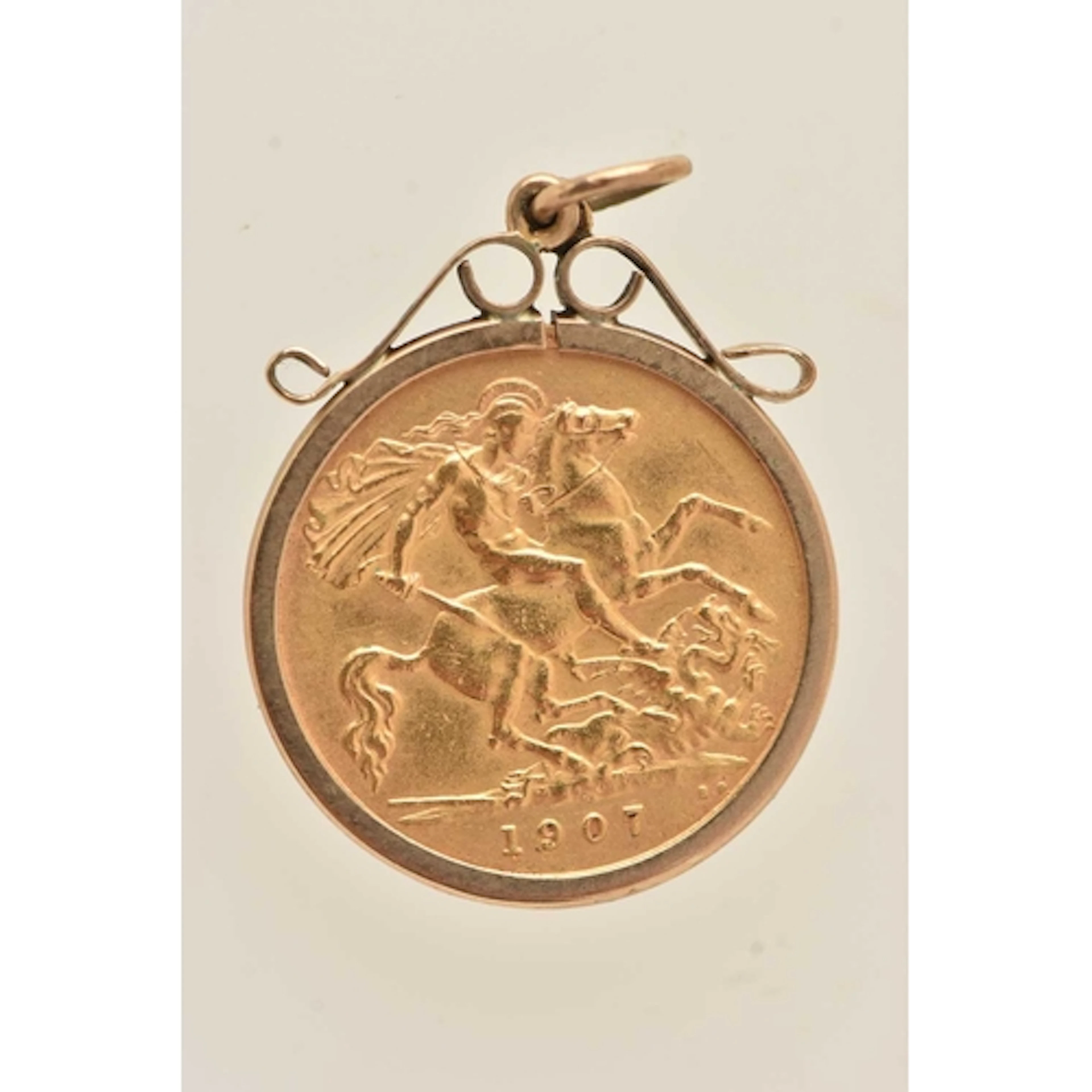 MOUNTED HALF GOLD SOVEREIGN COIN PENDANT, Edward VII, dated ...