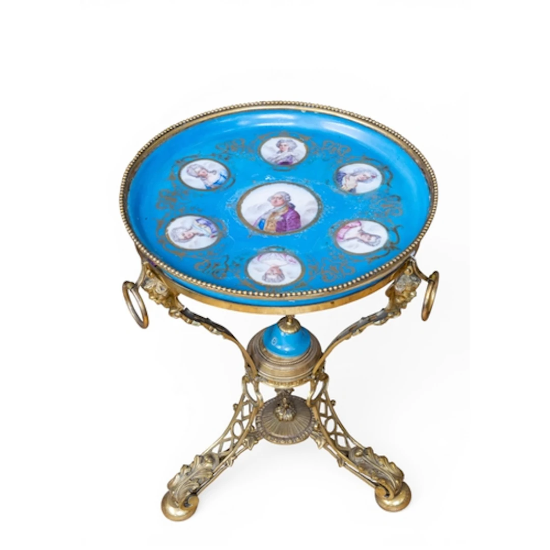 A SEVRES SIDE TABLE the circular porcelain top decorated wit...