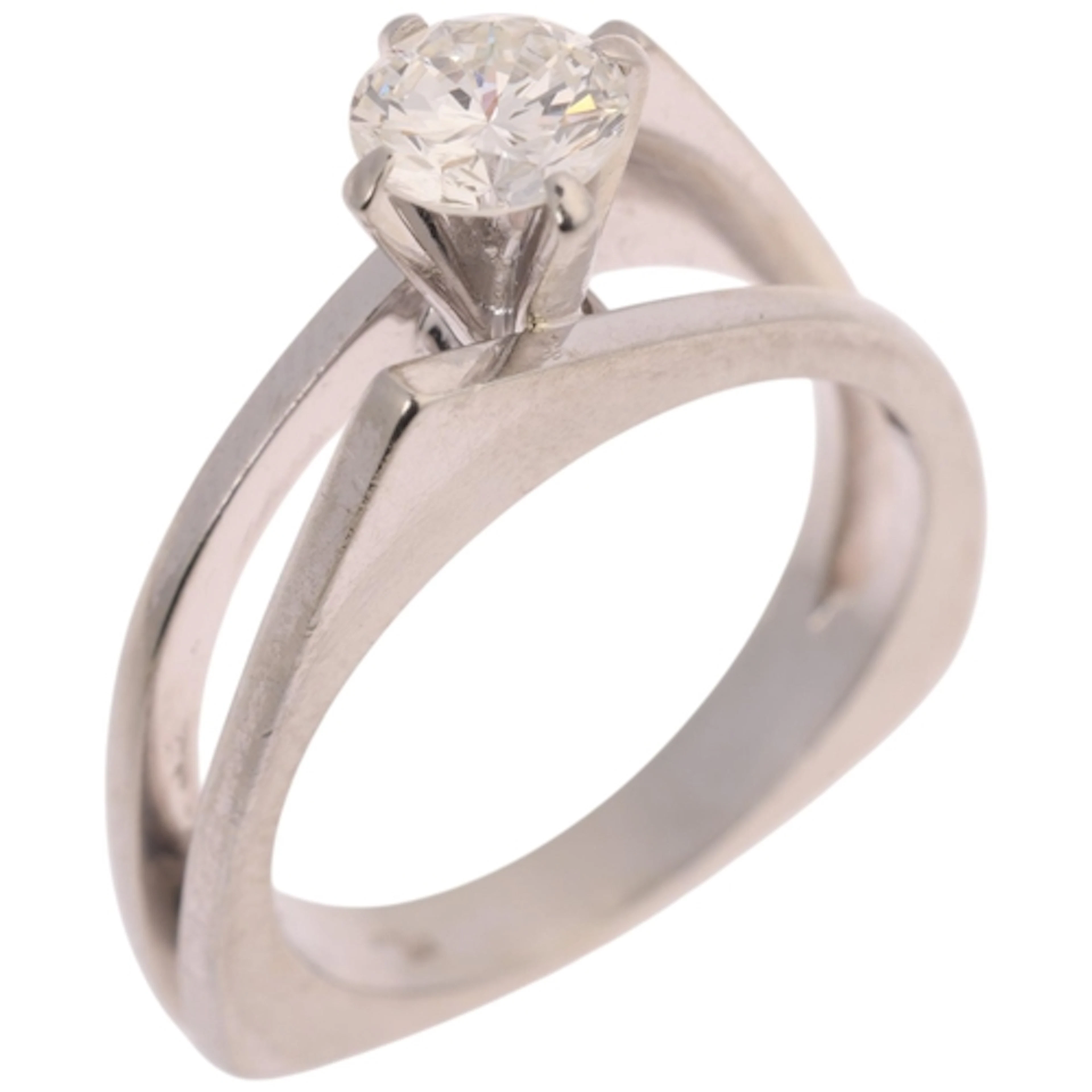 An 18ct white gold 0.65ct single stone diamond ring, claw se...