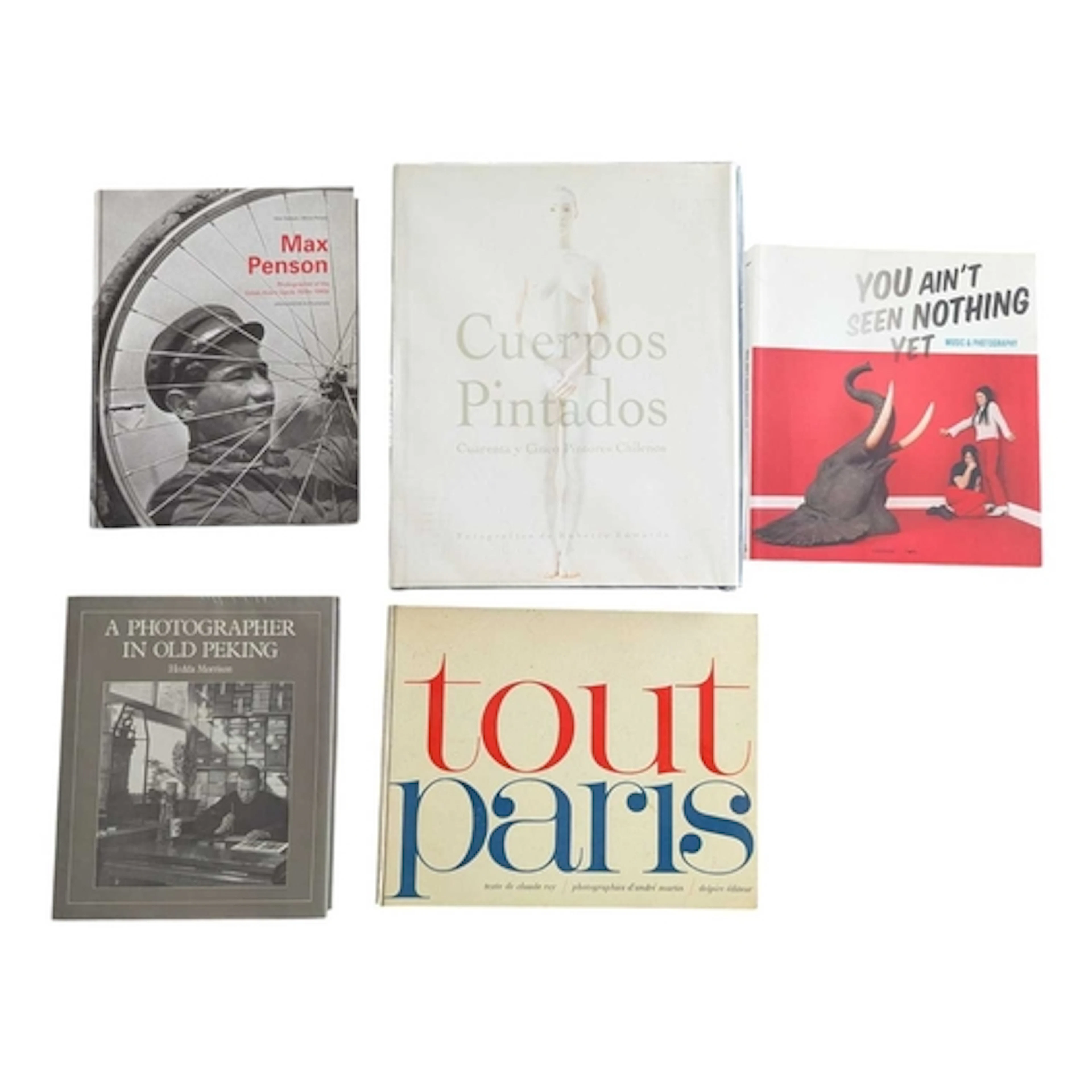 A selection of large photography books. To include Max Penso...