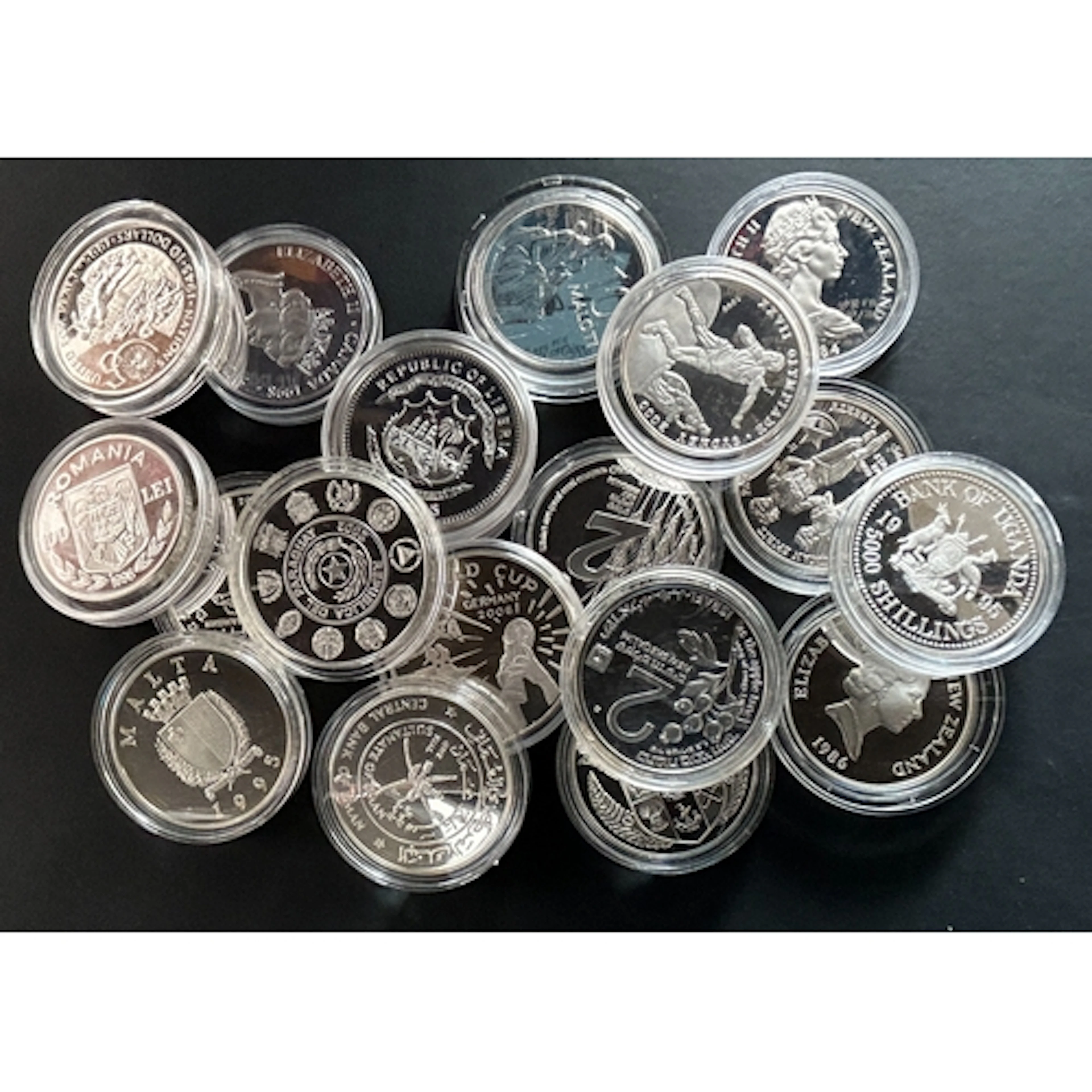 A group of nineteen World silver proof Crown-size coins, mai...