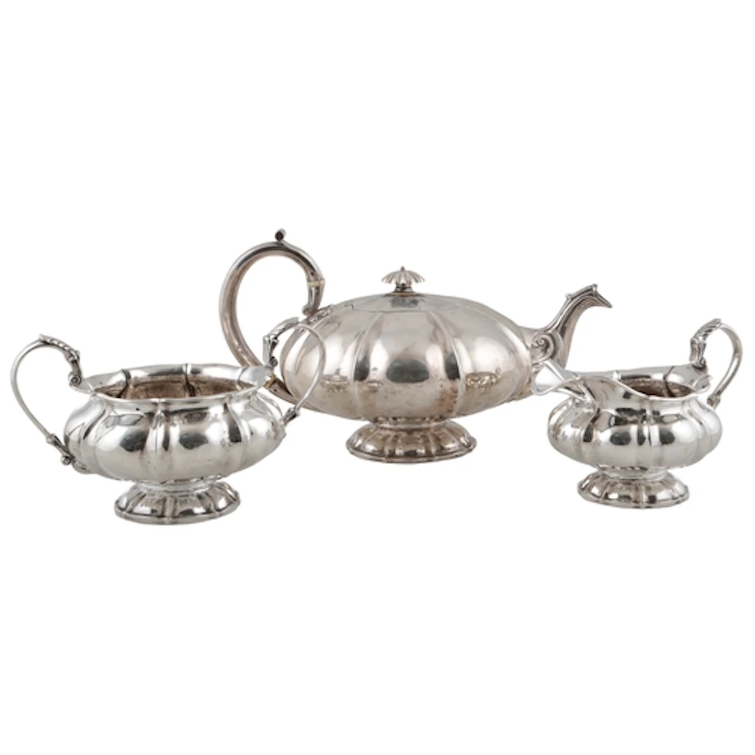 A William IV Irish silver melon shaped three piece tea set, ...