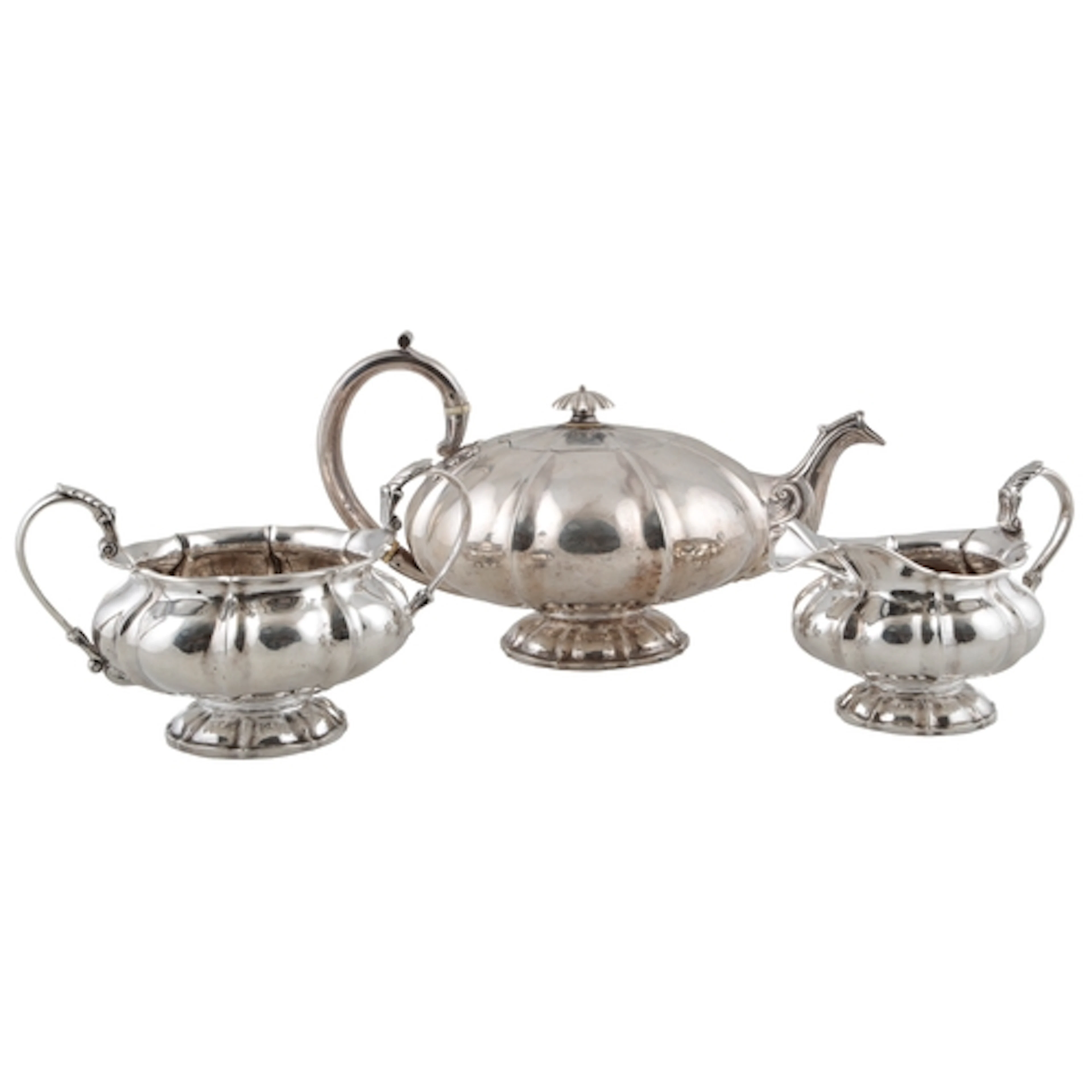 A William IV Irish silver melon shaped three piece tea set, ...
