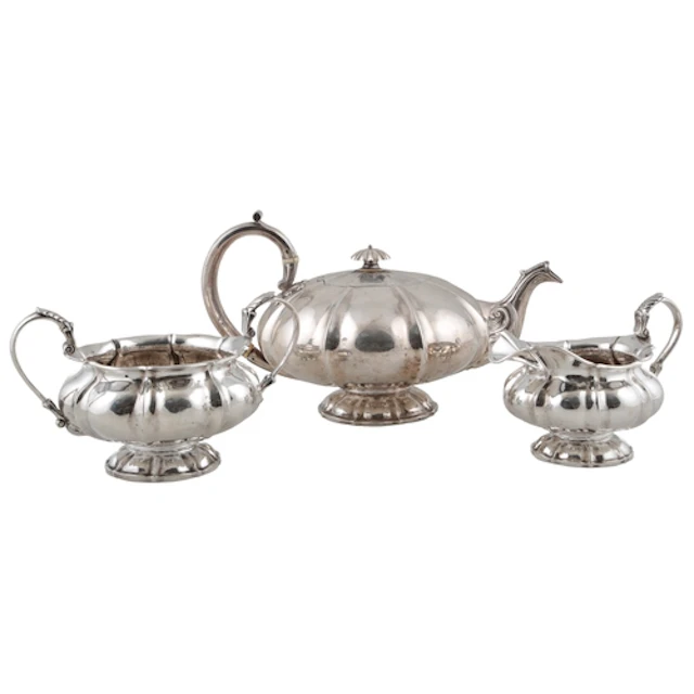 A William IV Irish silver melon shaped three piece tea set, ...