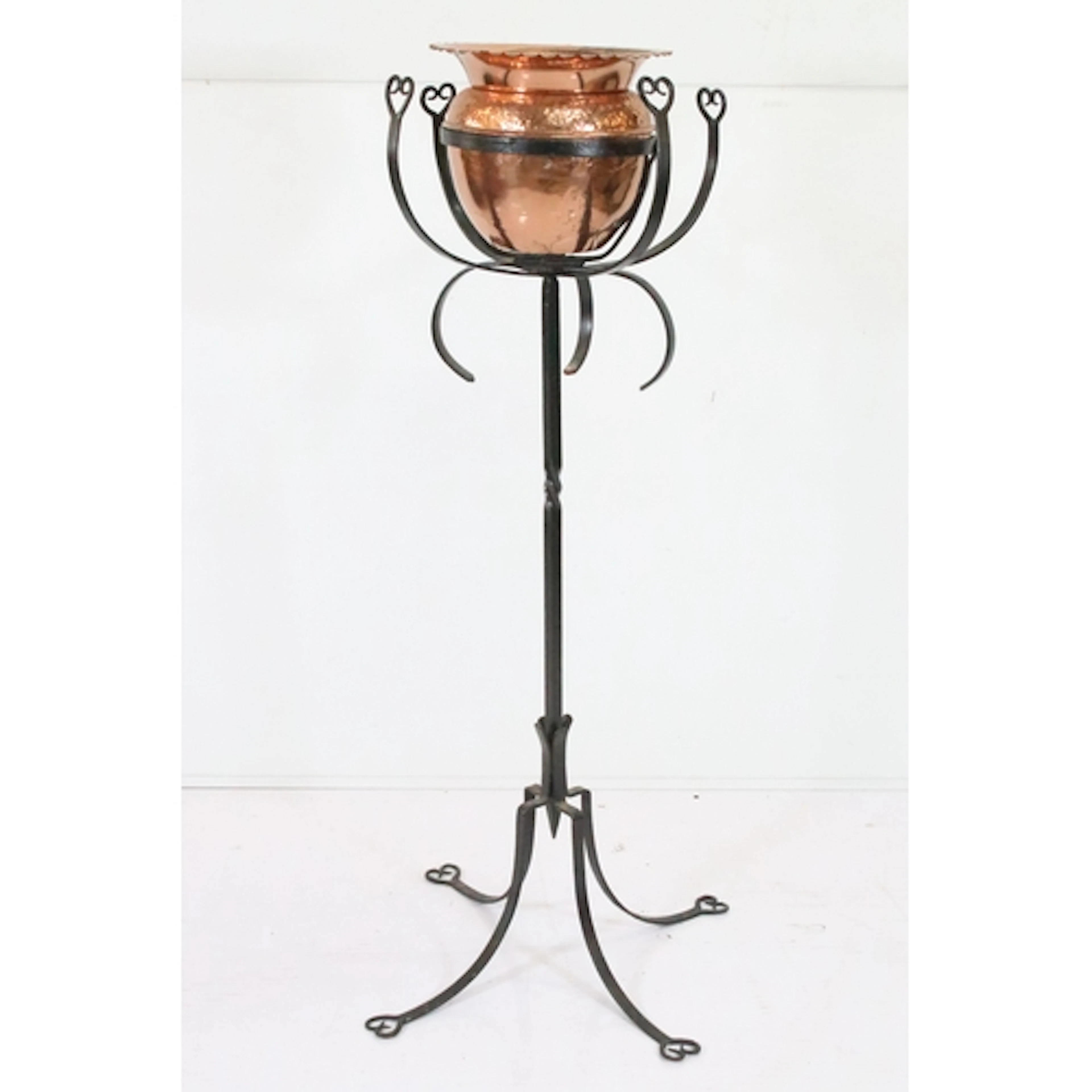 Arts and Crafts wrought iron and copper jardiniere, having h...
