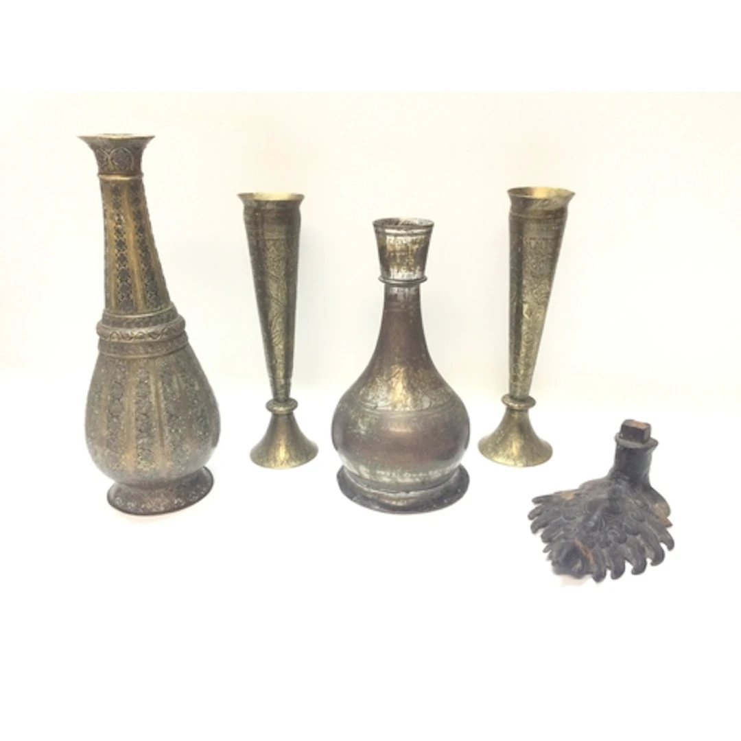 Middle Eastern hand-etched brass vessels and an unusual cast...